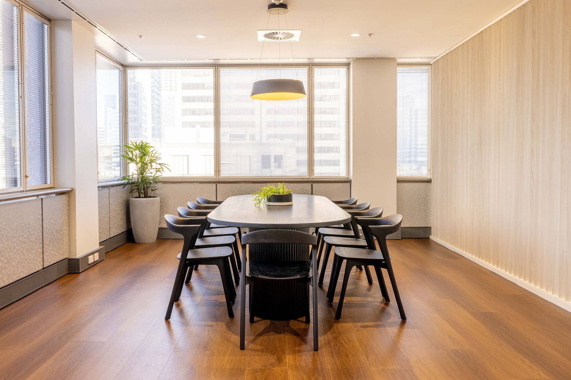 Pictured here: Benjamin Ripple Oval Dining Table and Ethnicraft Bok Dining Chair