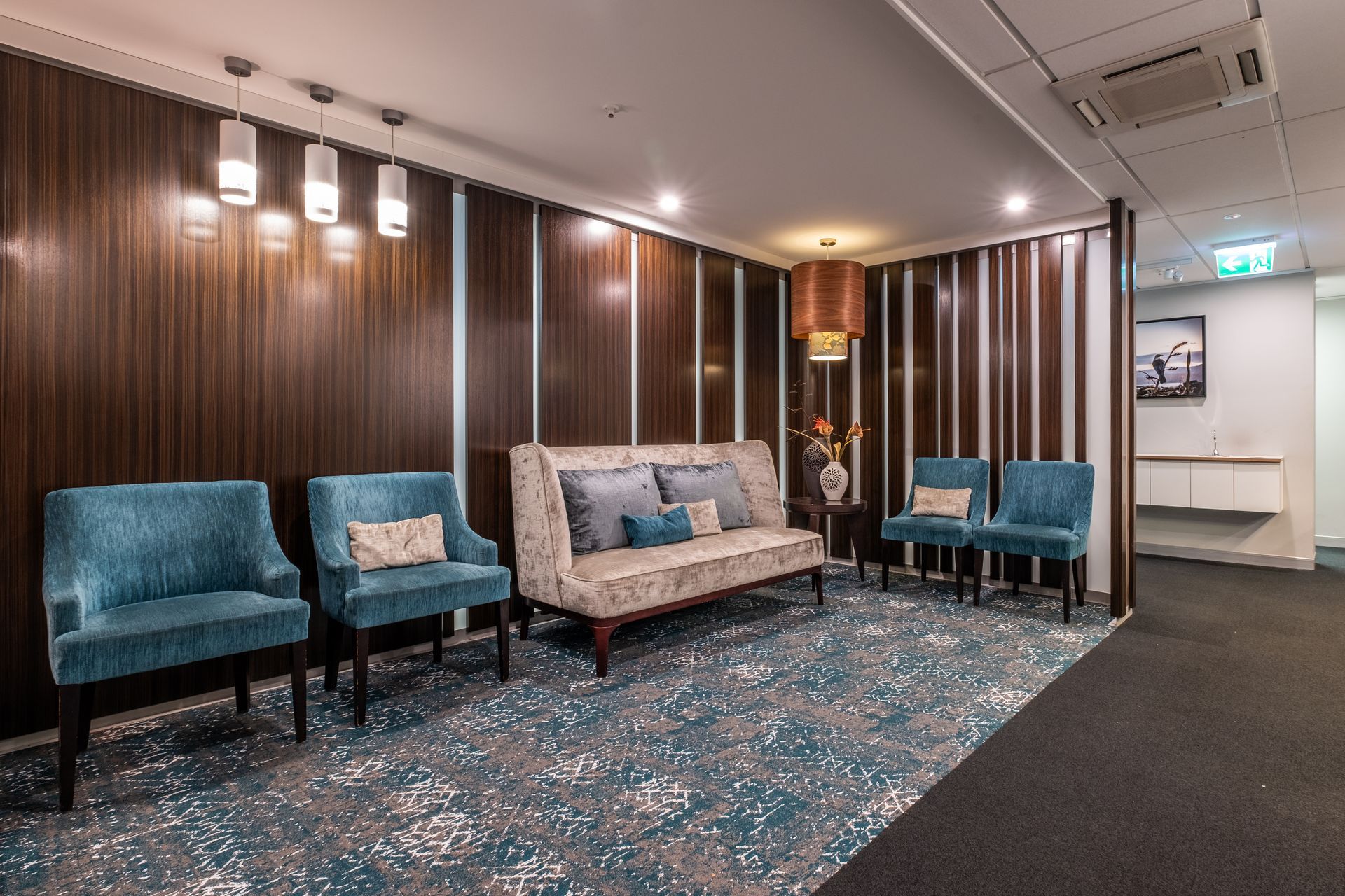 A dental practice with a difference as it has a lounge for a waiting area - Home away from Home using quality NZ made furniture by David Shaw.