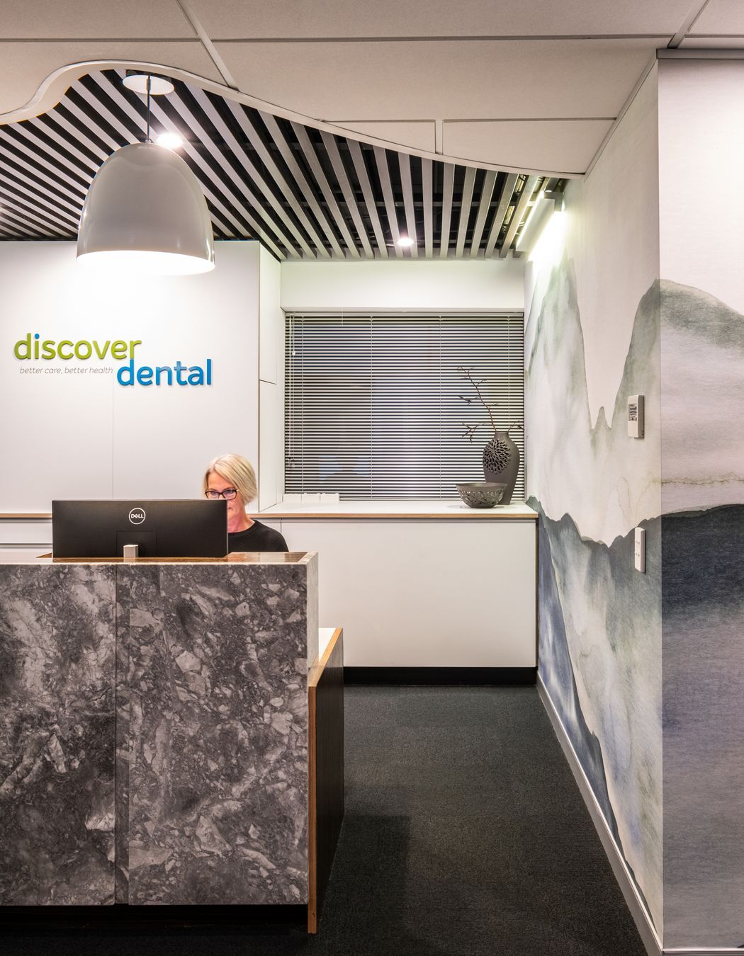 Organic materials, carpet tiles made from recycled materials. New branding to reflect the nature theme.