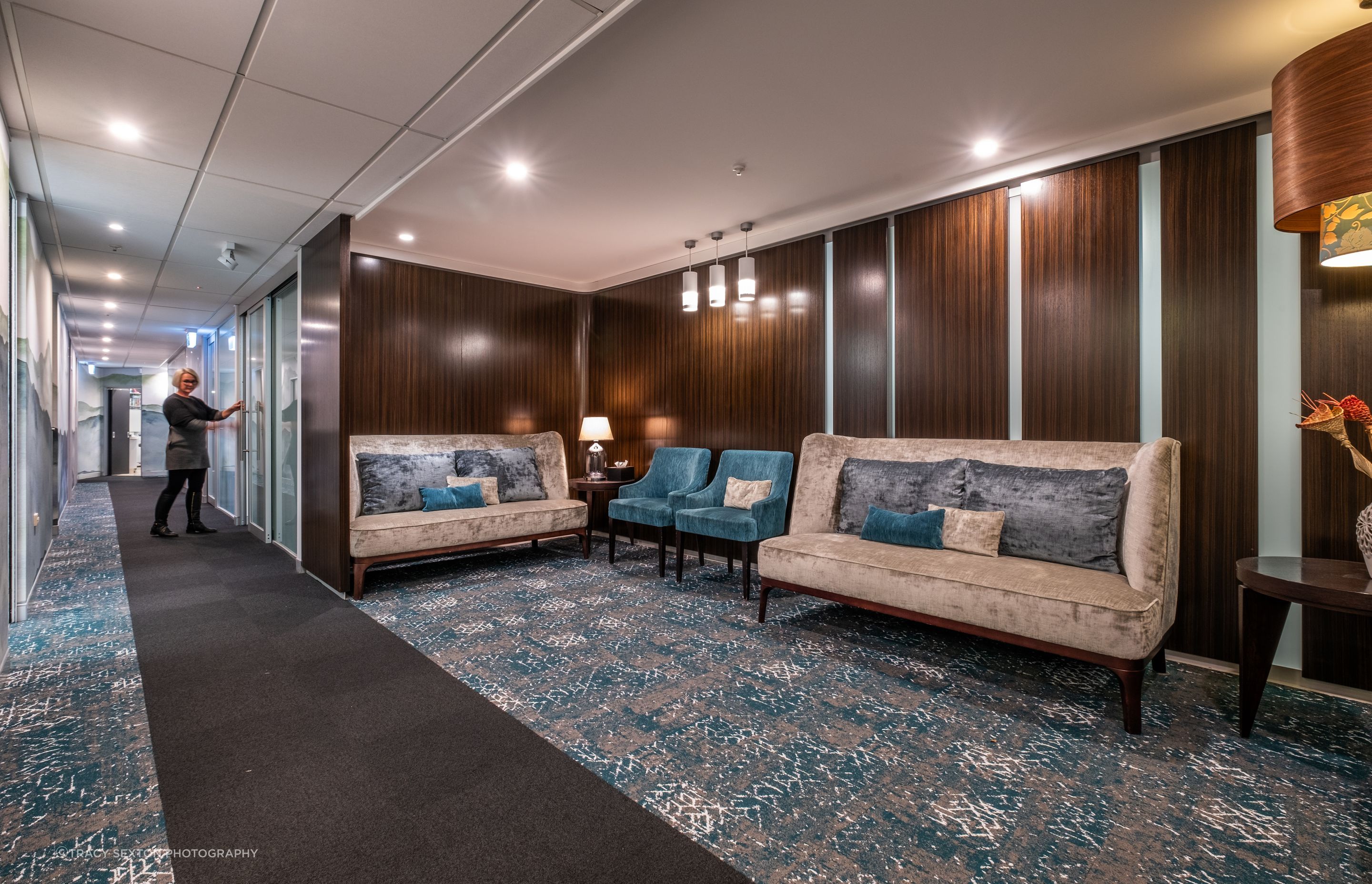Feature carpet tile strip leads visitors down the hallway