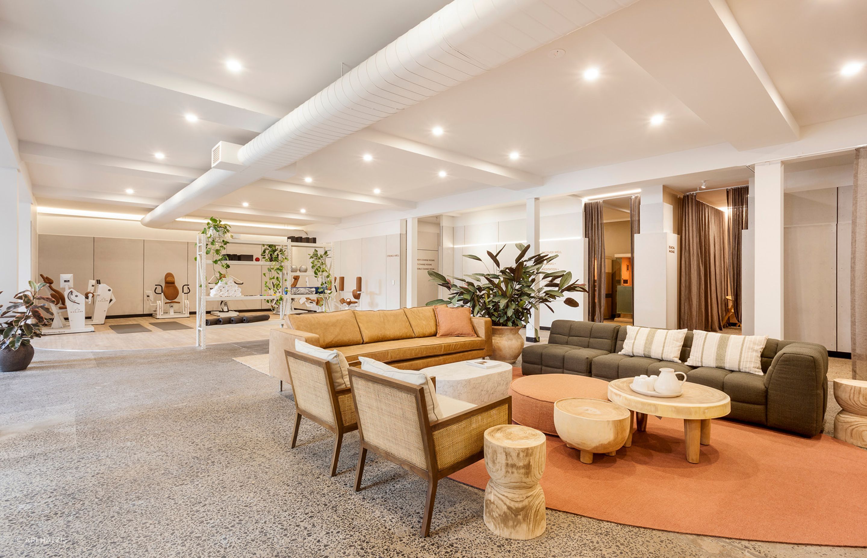 Pictured here: Adeline Square Occasional Chair, Vittoria Olive Modular Sofa, Woodland Organic Coffee Table, Orlando Seamed Round Ottoman and Elle Block Oval Coffee Table