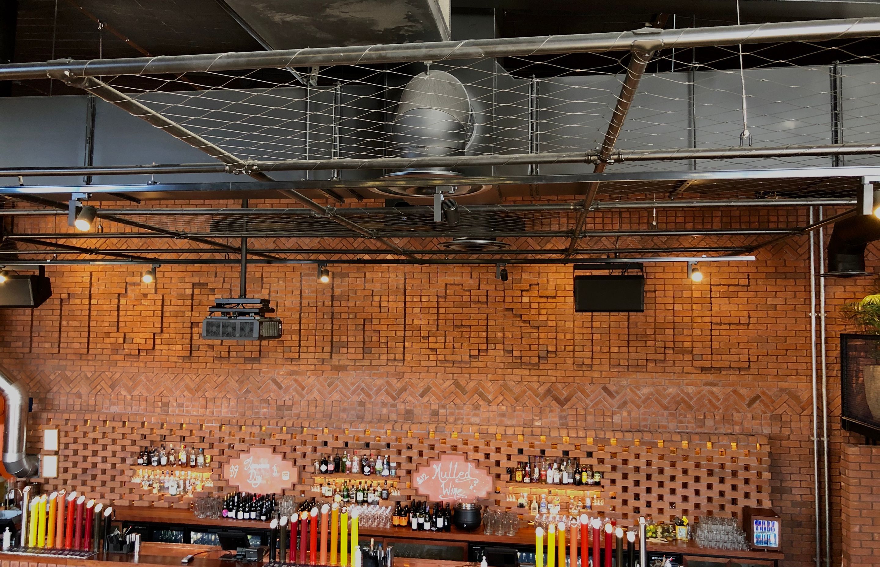 Morningside Tavern balustrades and mesh ceiling feature
