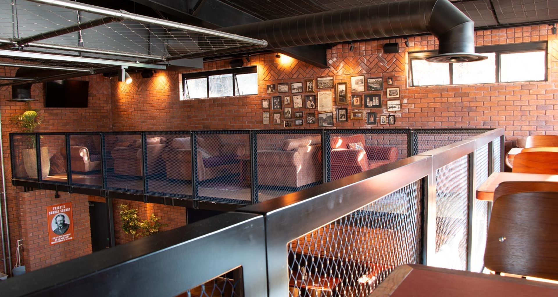 Morningside Tavern - balustrades and mesh ceiling feature banner