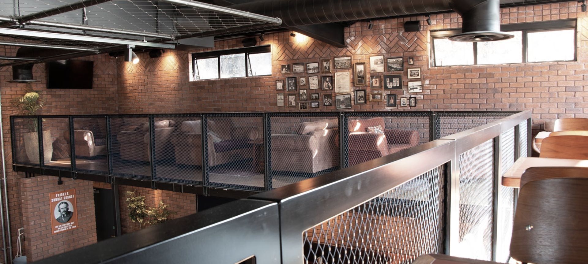 Morningside Tavern - balustrades and mesh ceiling feature banner