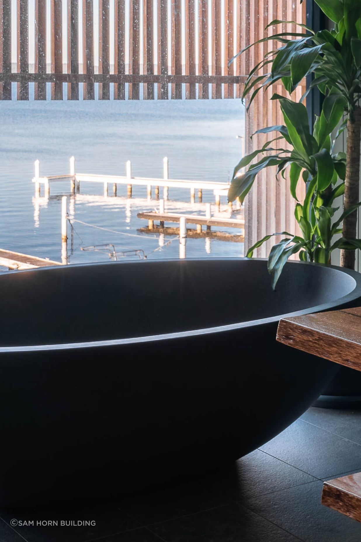 Award swimming bathtub views of Lake Macquarie
