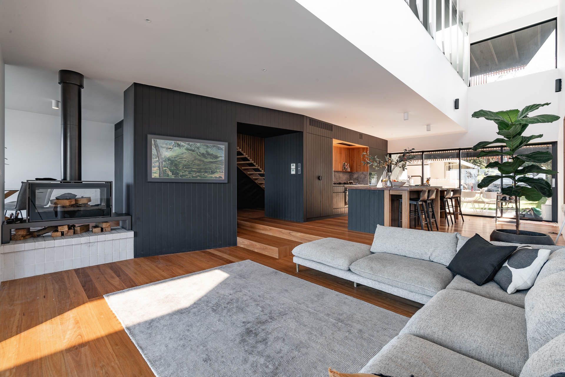 The Axis i1000 freestanding double-sided fireplace, a captivating centrepiece