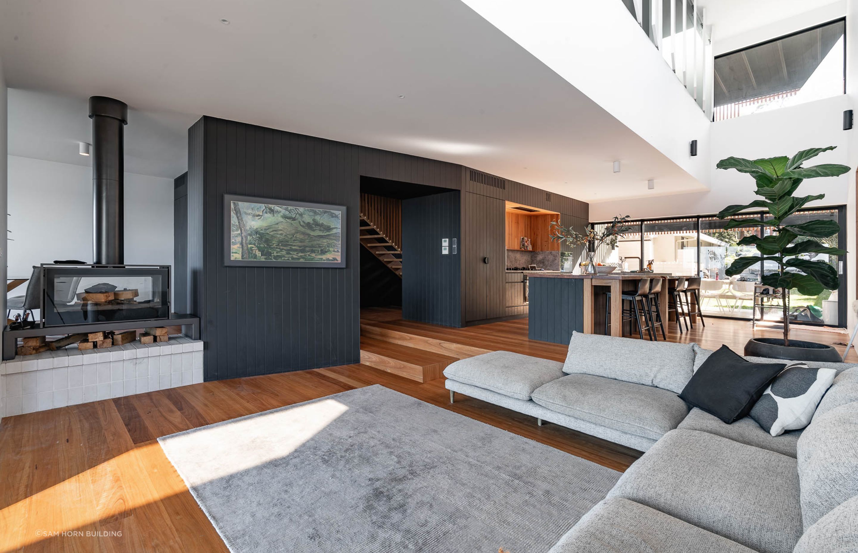 The Axis i1000 freestanding double-sided fireplace, a captivating centrepiece