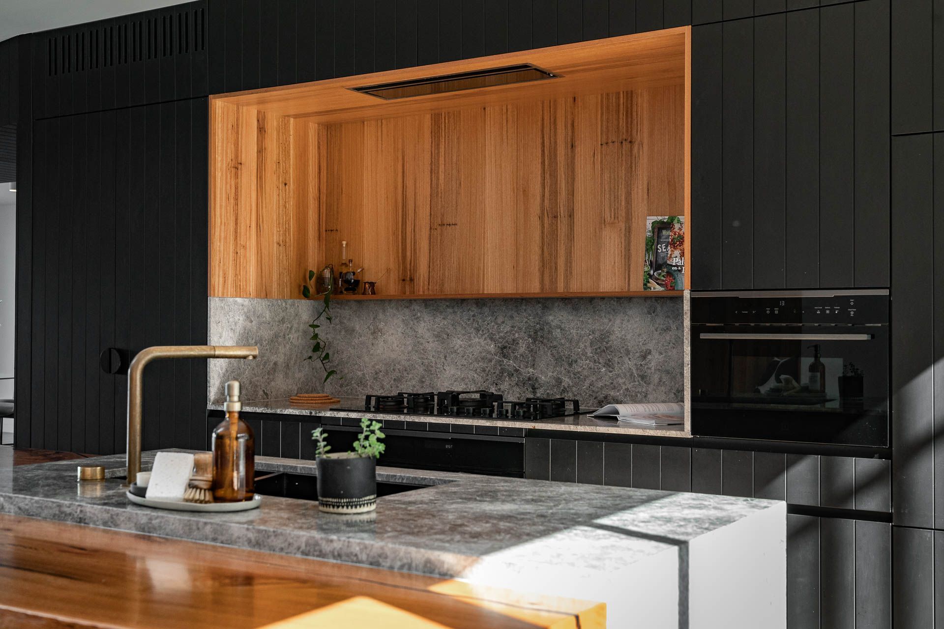 Modern luxury, fully-equiped kitchen with natural lighting