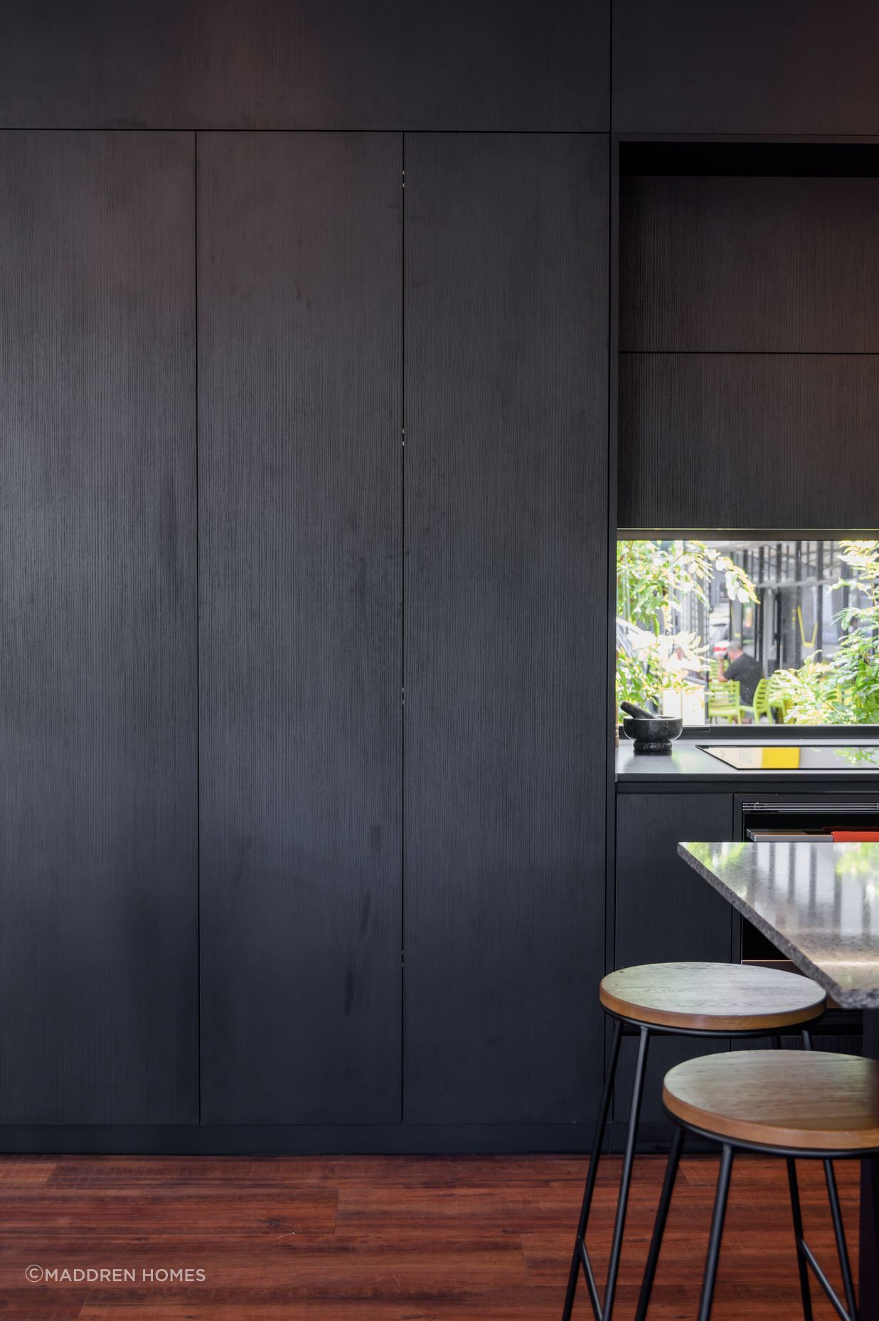 Black Grained Cabinetry with Tongue and Groove Feature