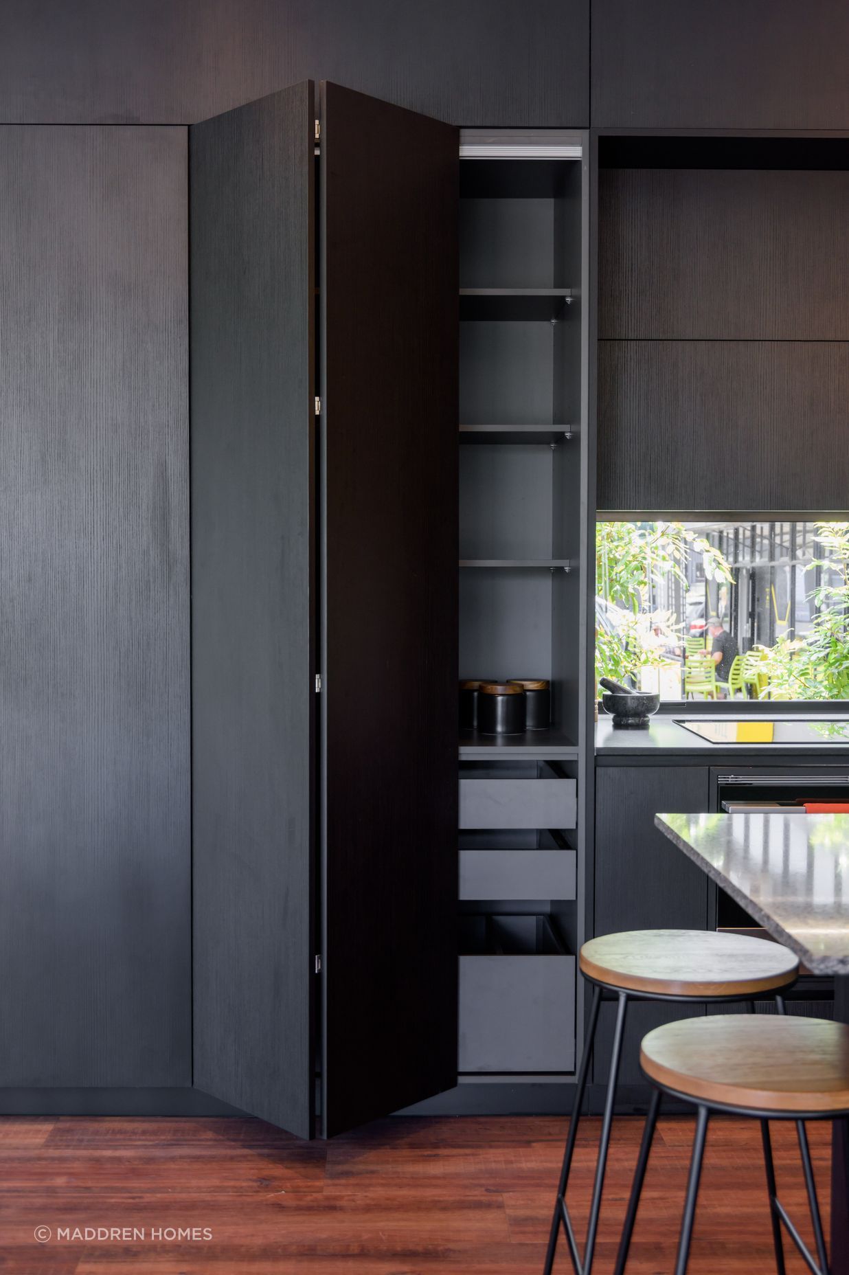 Black Grained Cabinetry with Tongue and Groove Feature