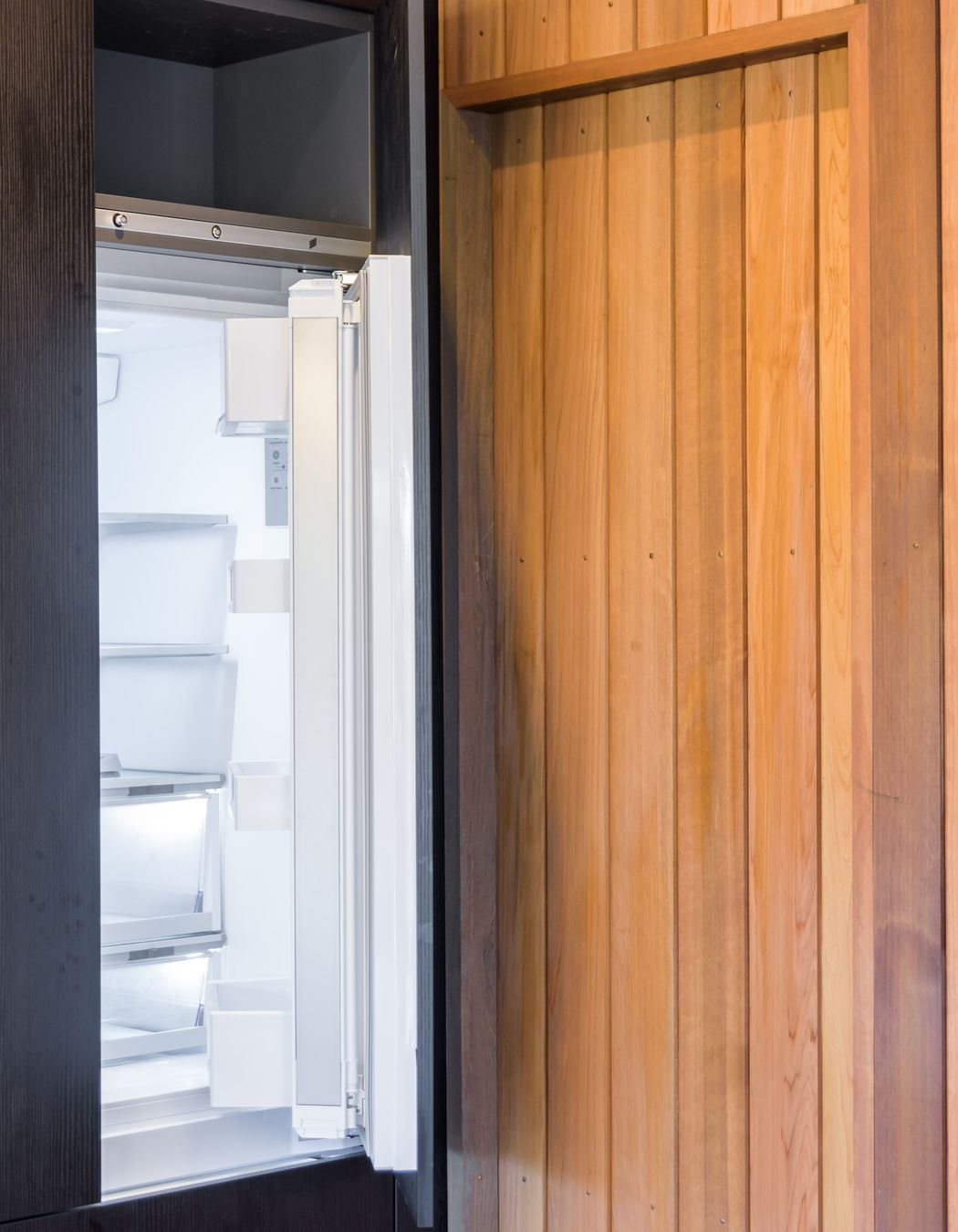 Black Grained Cabinetry with Tongue and Groove Feature