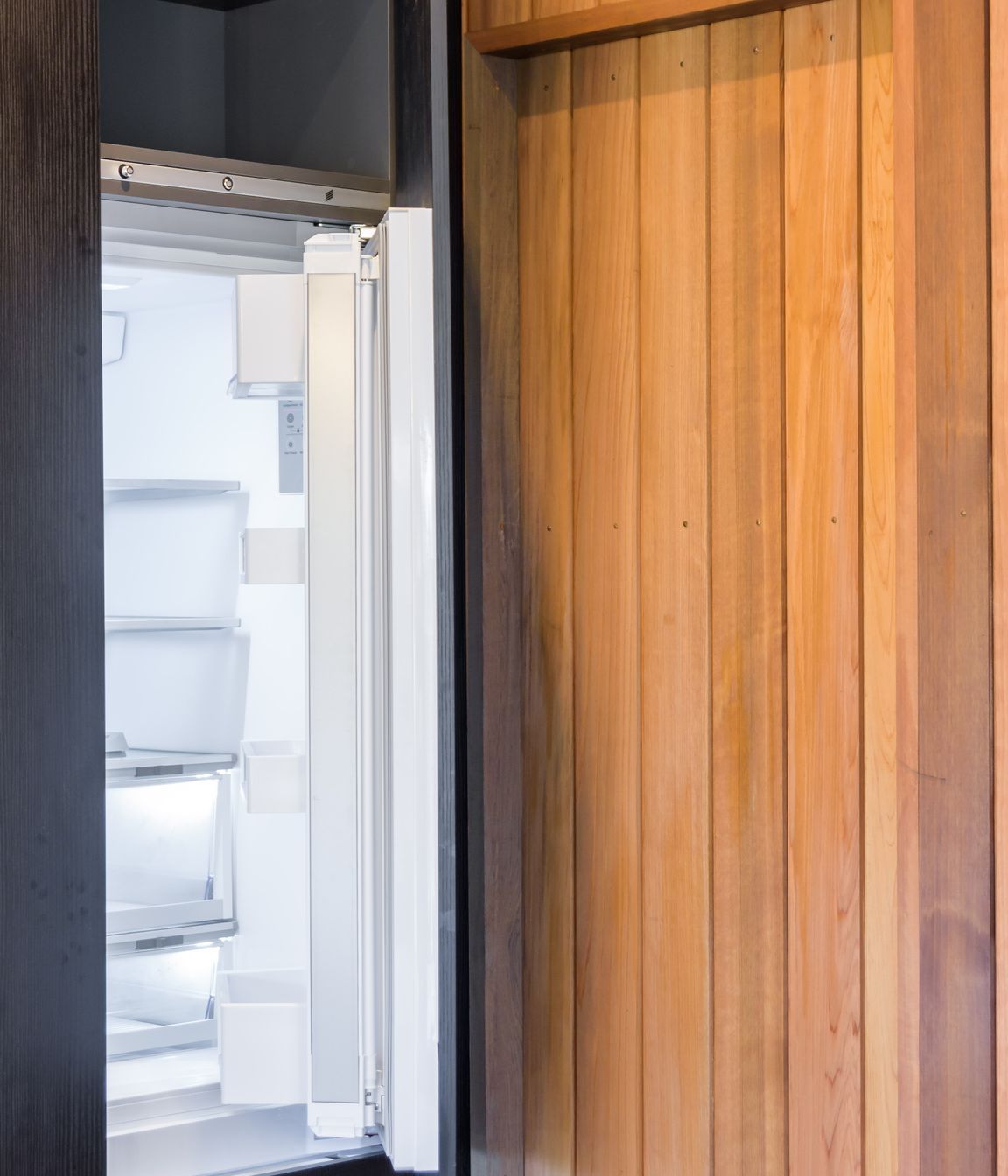 Black Grained Cabinetry with Tongue and Groove Feature