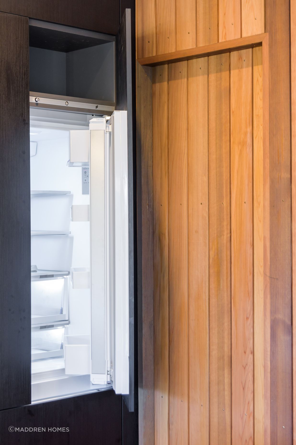 Black Grained Cabinetry with Tongue and Groove Feature