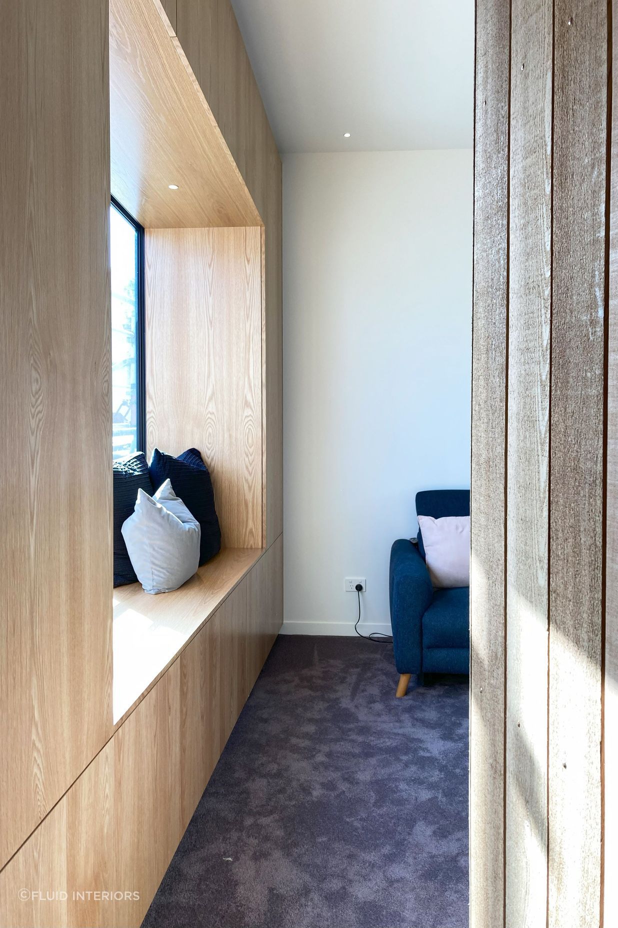 White V groove, black island and a scullery with a touch of pink