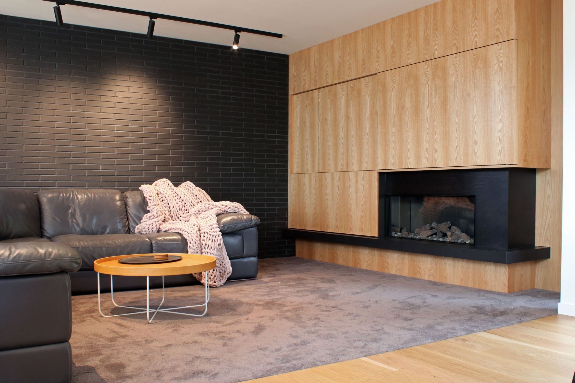 White V groove, black island and a scullery with a touch of pink