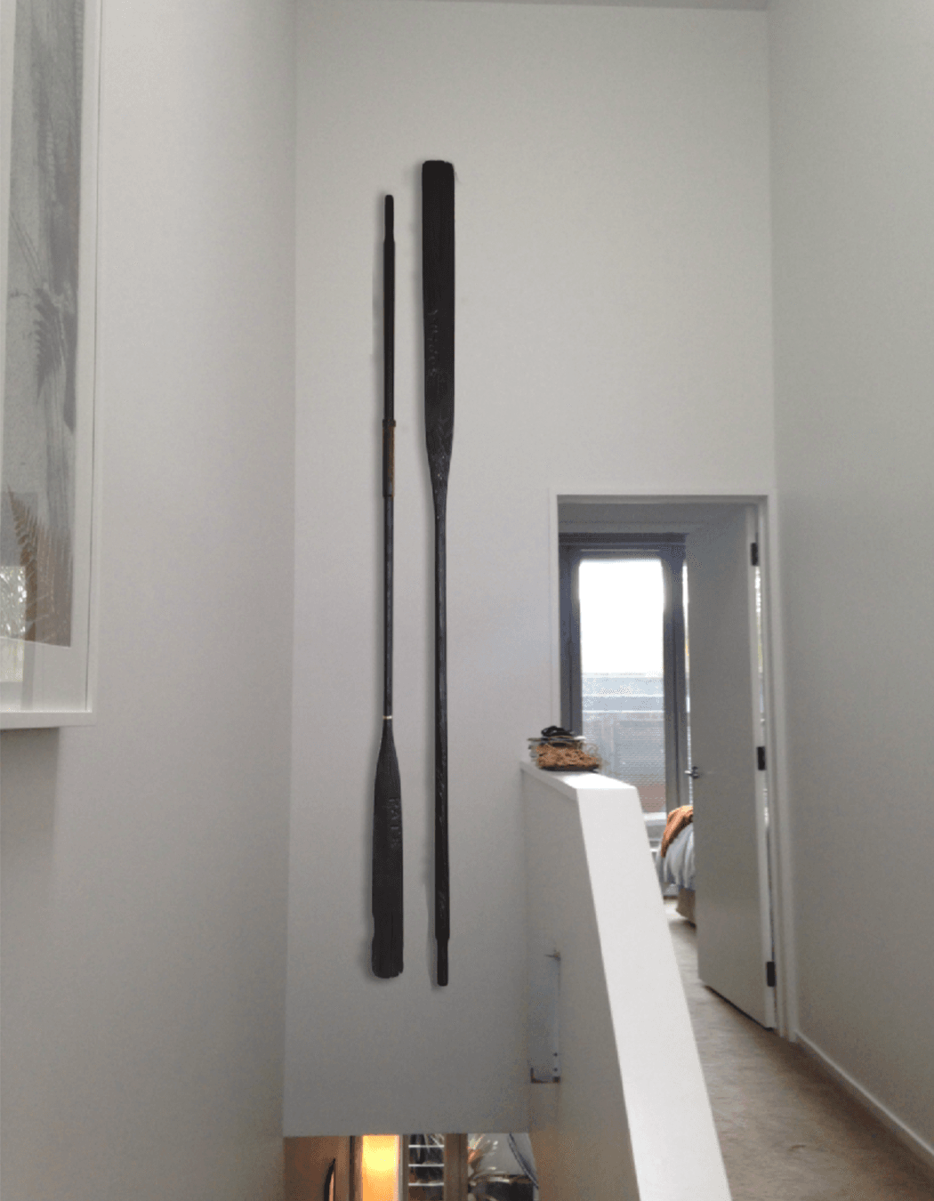 Antique de-commissioned wall hung oars - Sophia Pate 2017. Private collection Auckland.