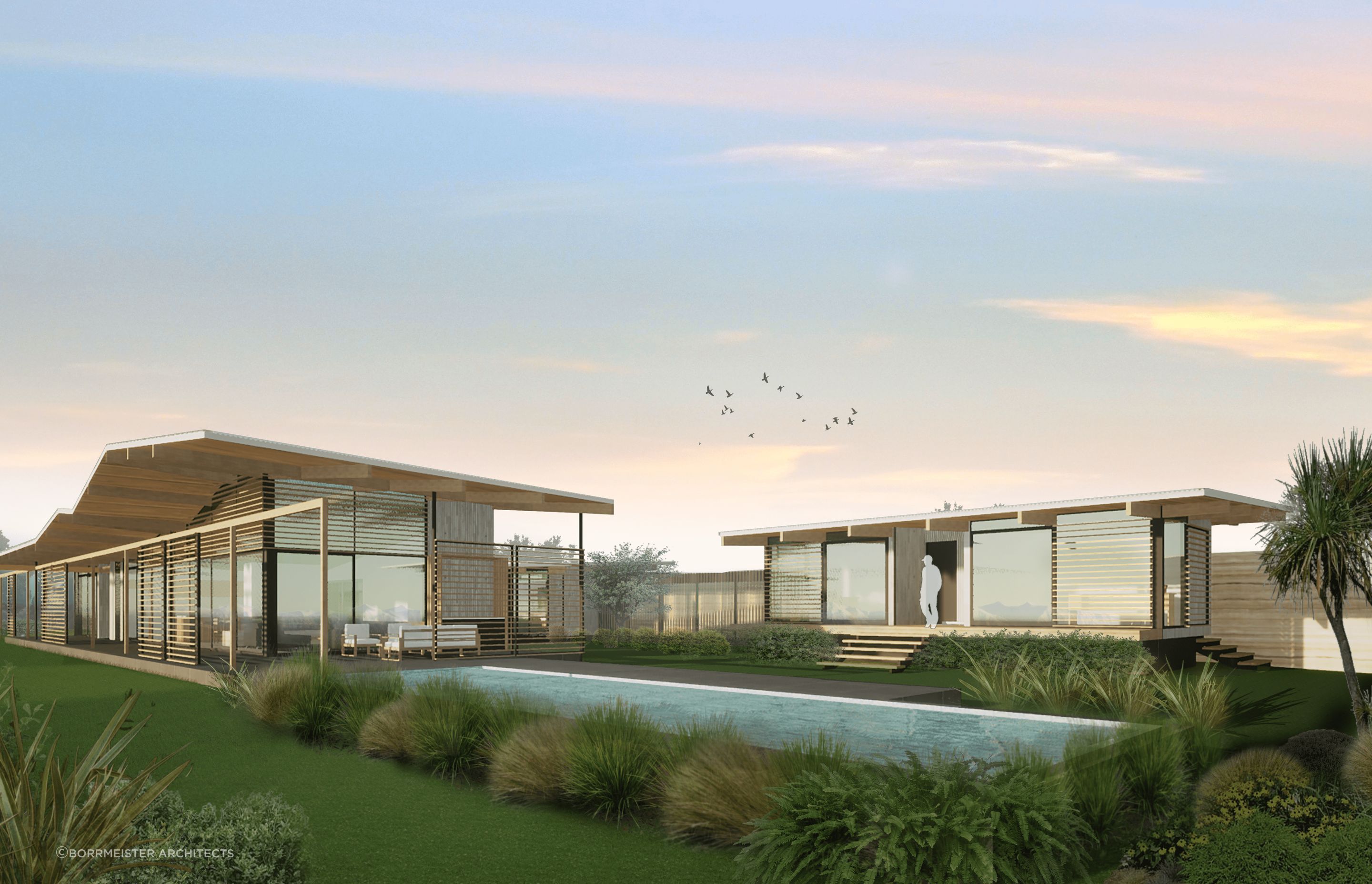 Family home on the Canterbury Plains responds boldly to its surrounding landscape, as it stretches out wide across the flat plains and soars towards the Southern Alps with its folding roofline.