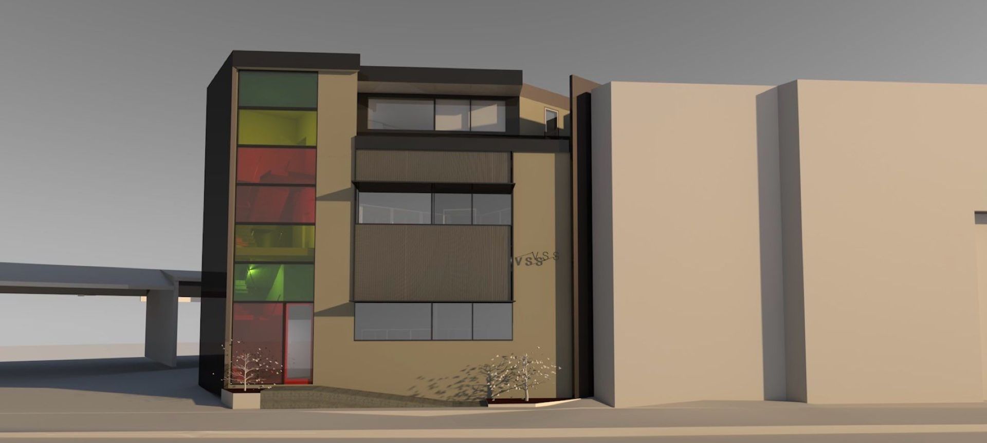 Streetfacade with coloured laminated glass to the stair, shading to windows