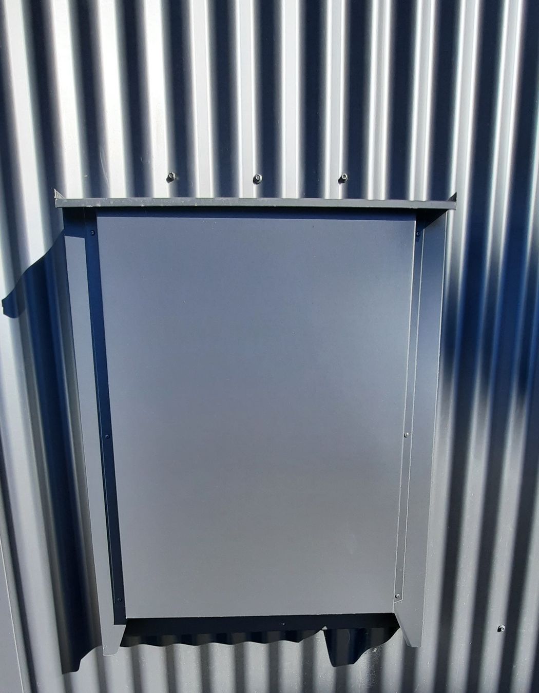 Precise metal folding detail to hide the power box on the visible street side