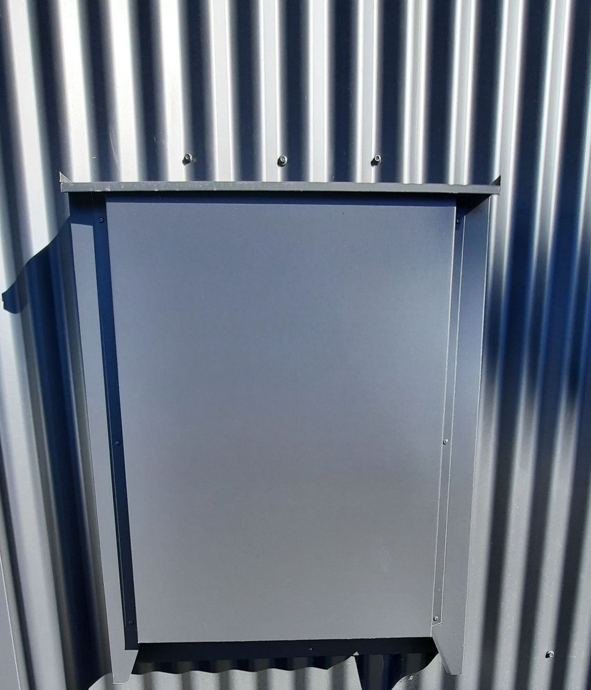 Precise metal folding detail to hide the power box on the visible street side