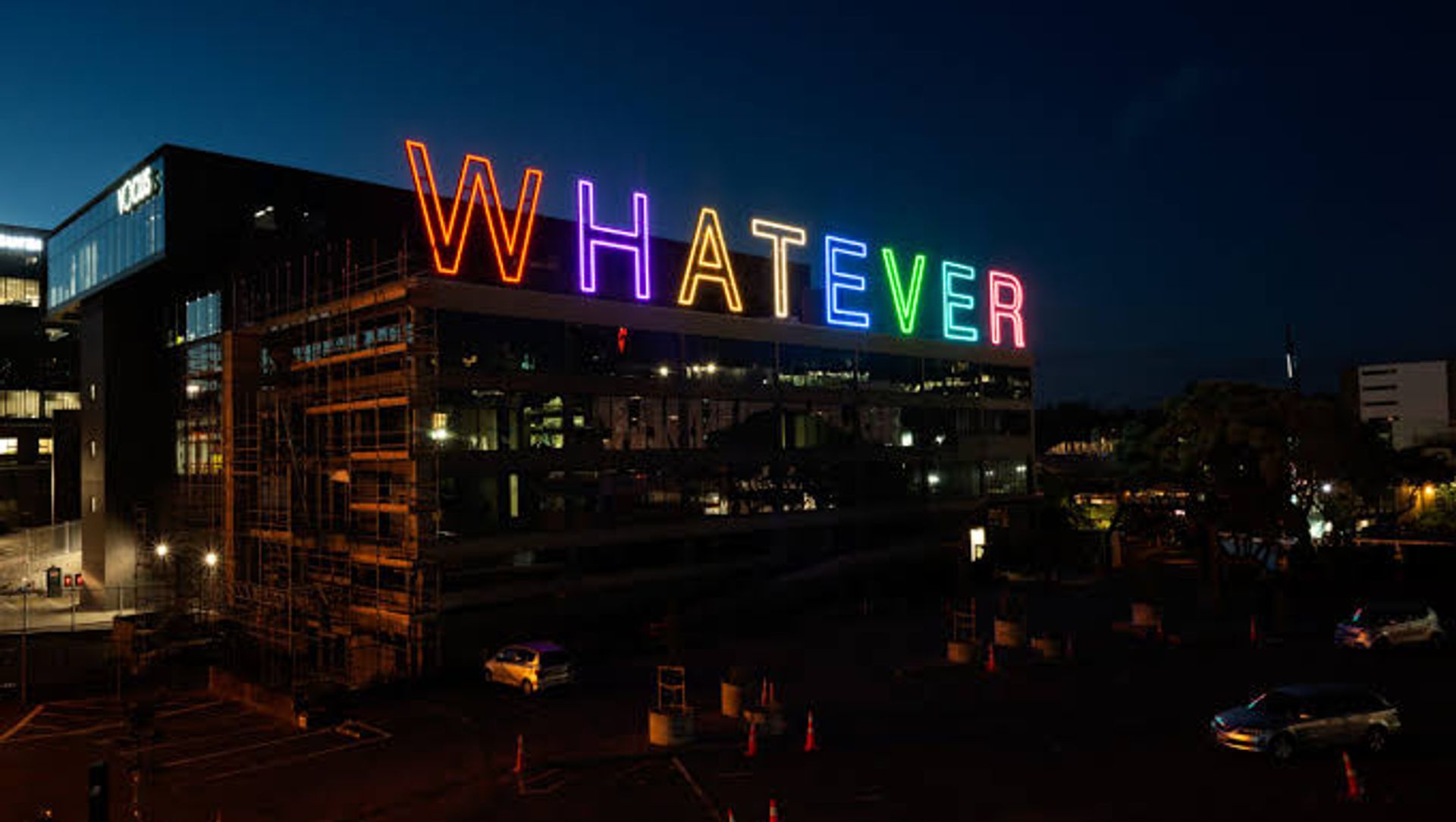 WHATEVER building banner