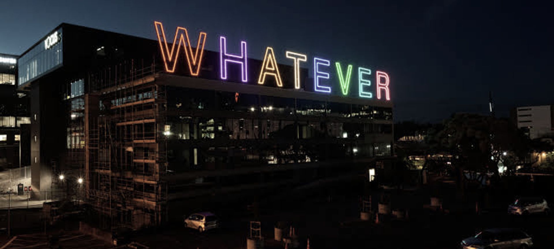 WHATEVER building banner