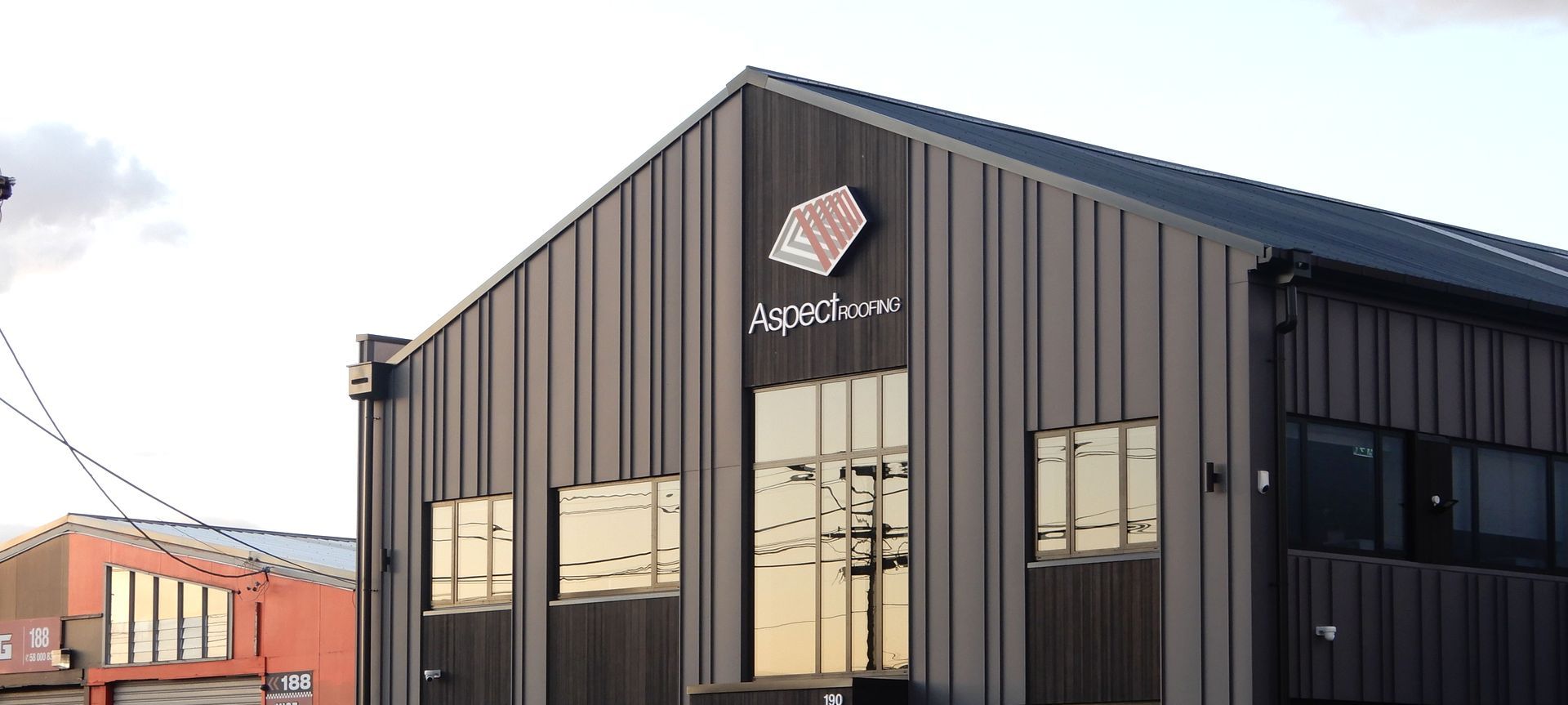 190 Marua Road - Angle Seam Variable Cladding - Colorsteel MATTE banner