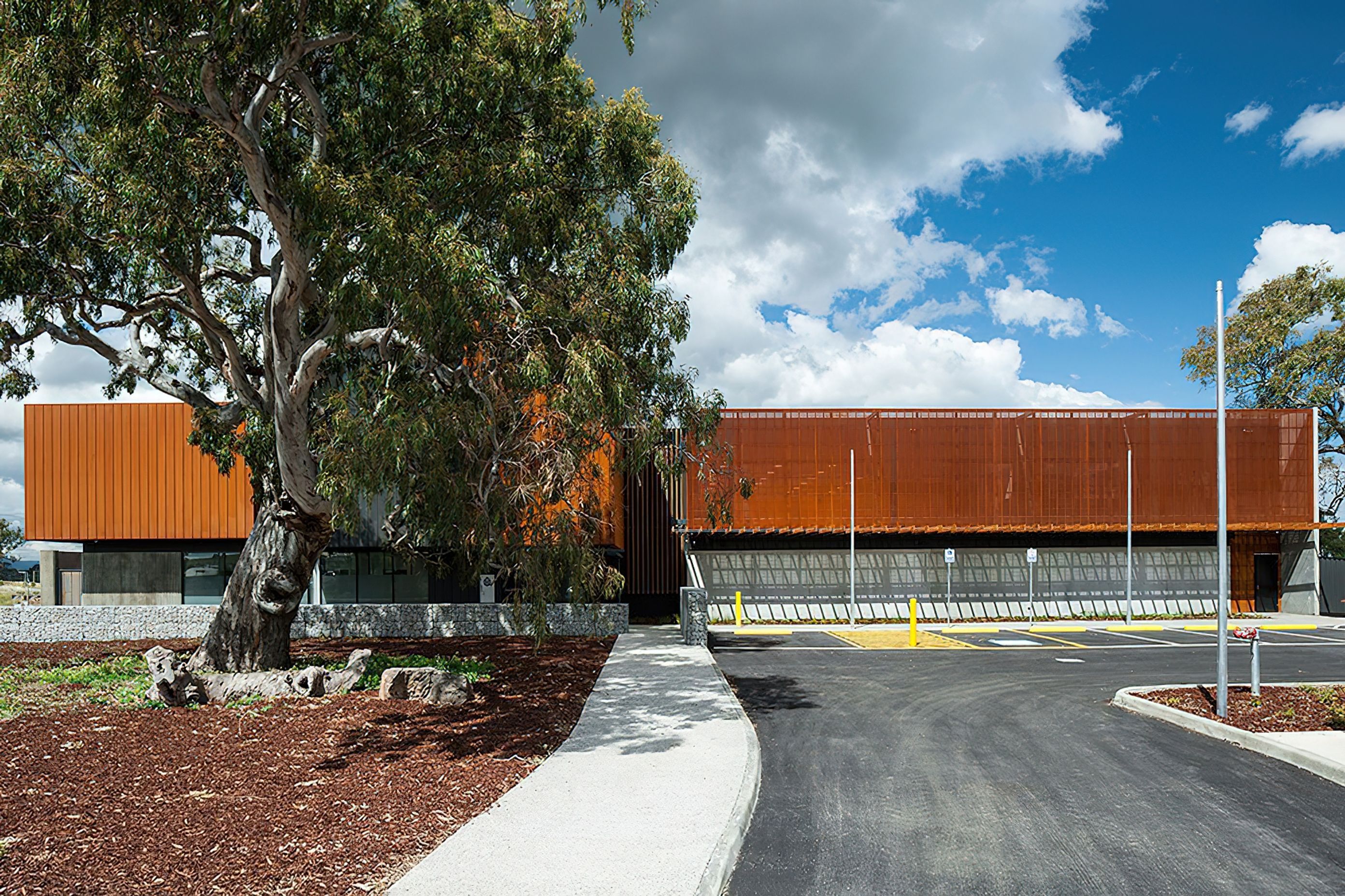 ##Mernda Police Station, Vic - Custom Perforated Corten &amp; Pvdf Satin Black Aluminium