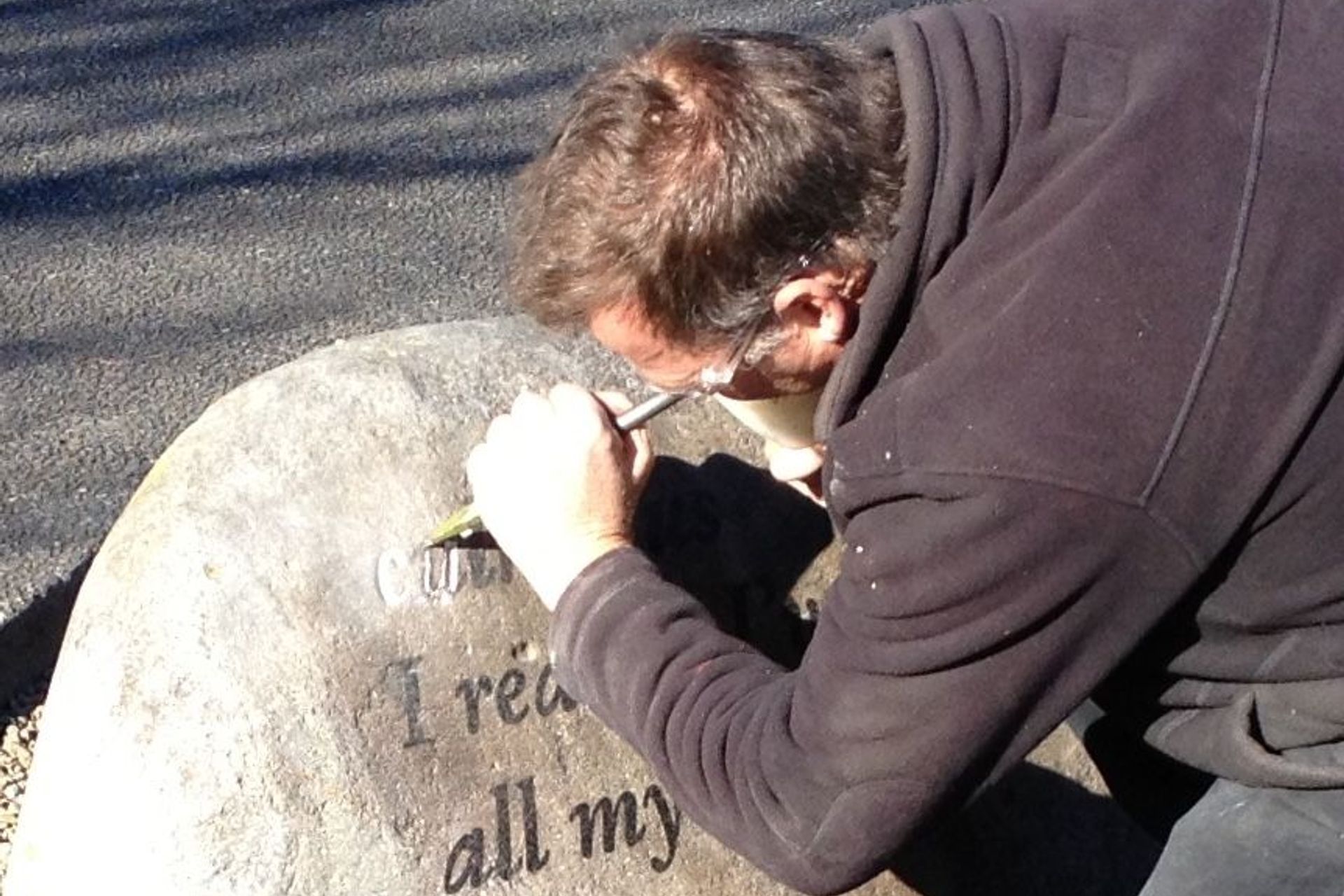 Hand carved v- cut lettering Katikati Haiku pathway by Paul Gautron