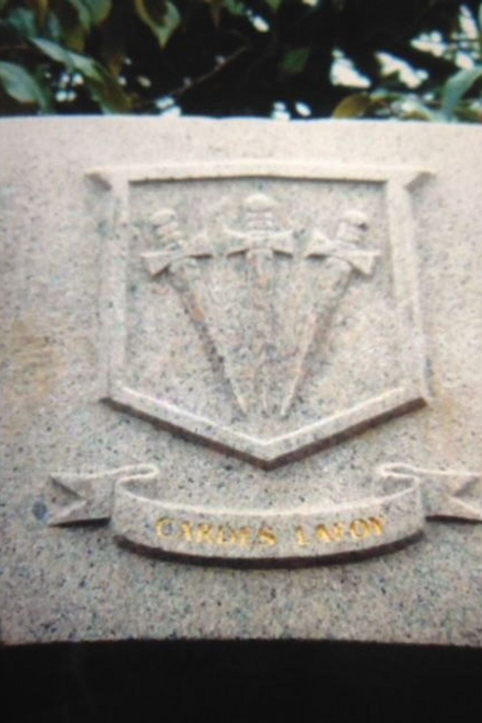 Carved family coat of arms in granite by Paul Gautron