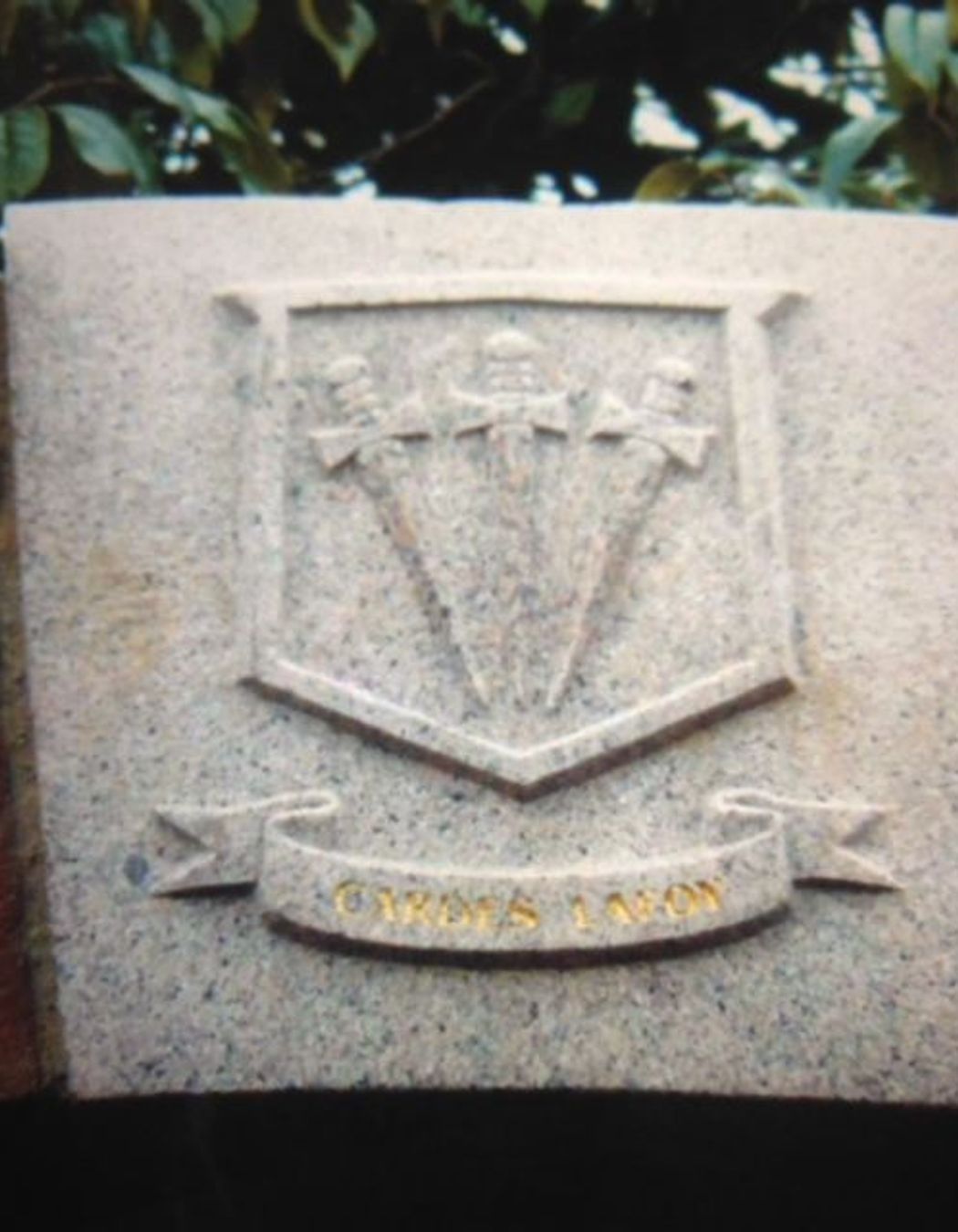 Carved family coat of arms in granite by Paul Gautron