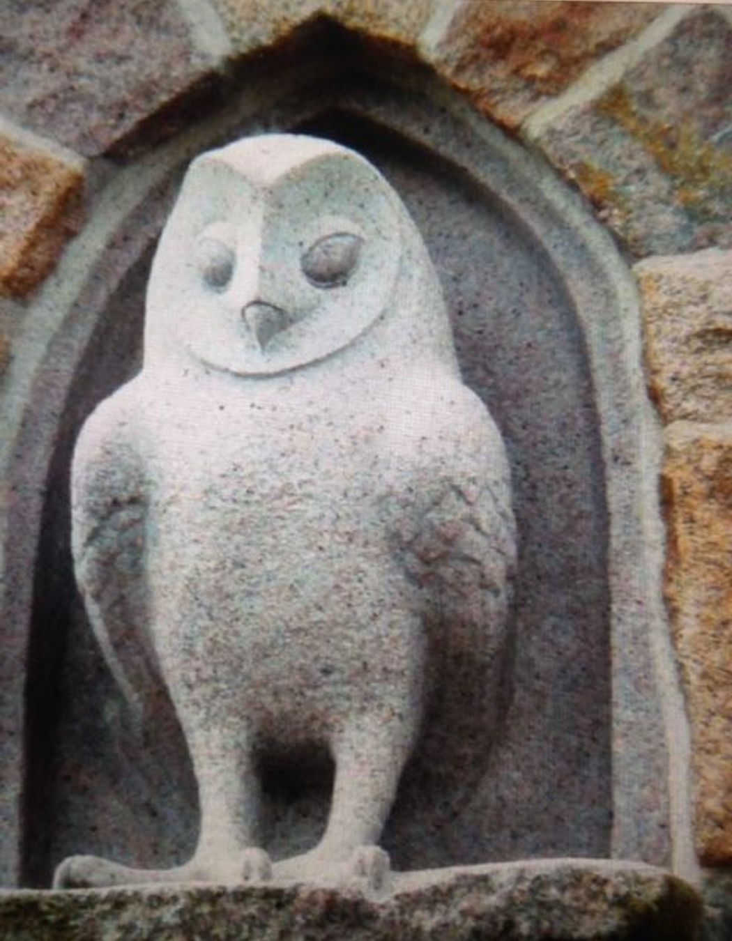 Carved granite owl and arch By Paul Gautron