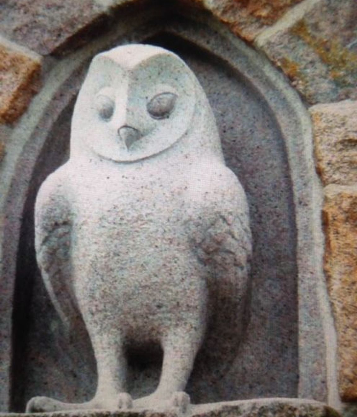 Carved granite owl and arch By Paul Gautron