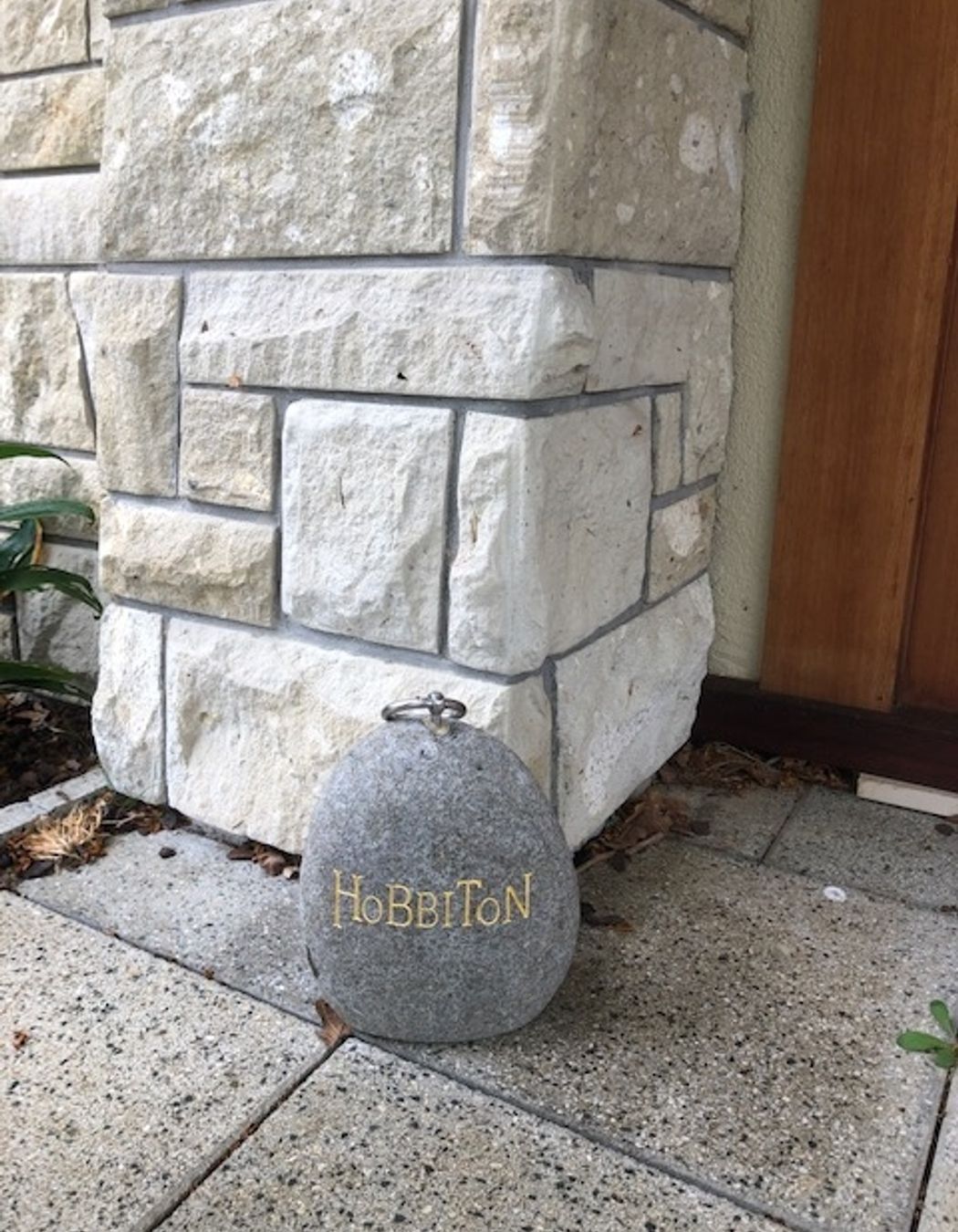 V-cut gold lettering Hobbiton Film set by Paul Gautron