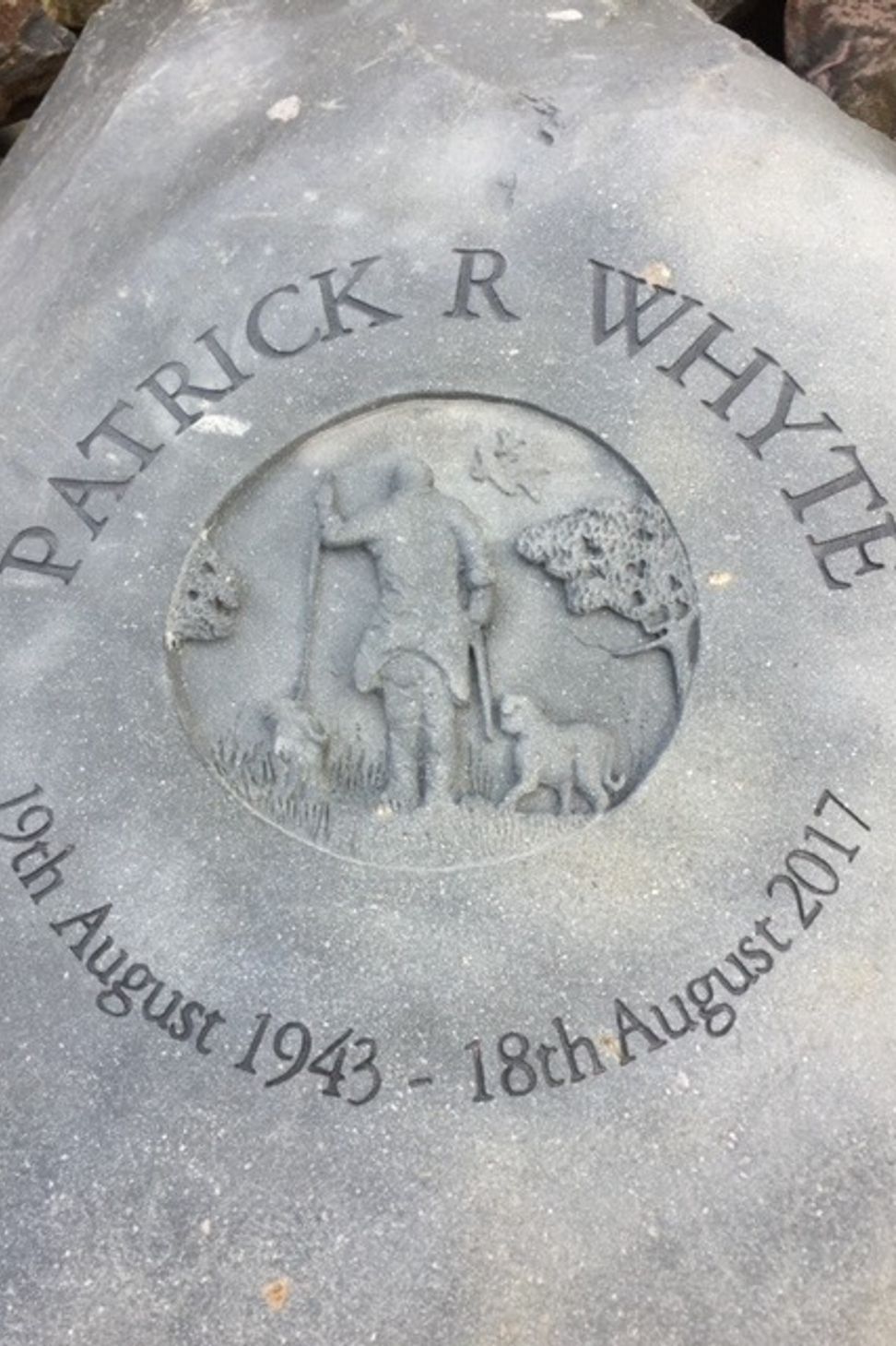 Carved memorial stone by Paul Gautron