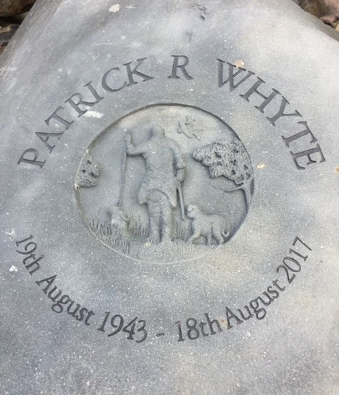 Carved memorial stone by Paul Gautron