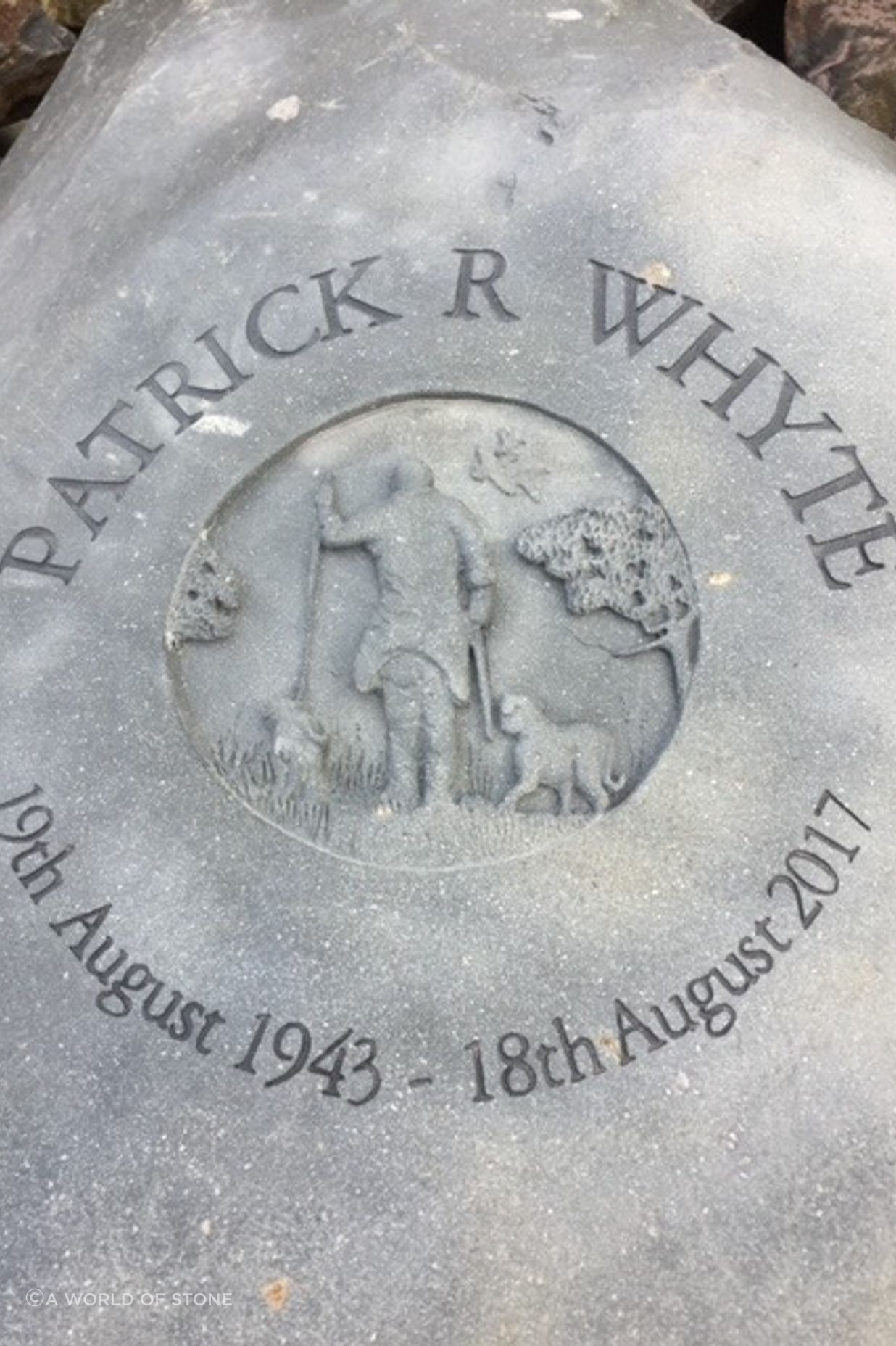 Carved memorial stone by Paul Gautron