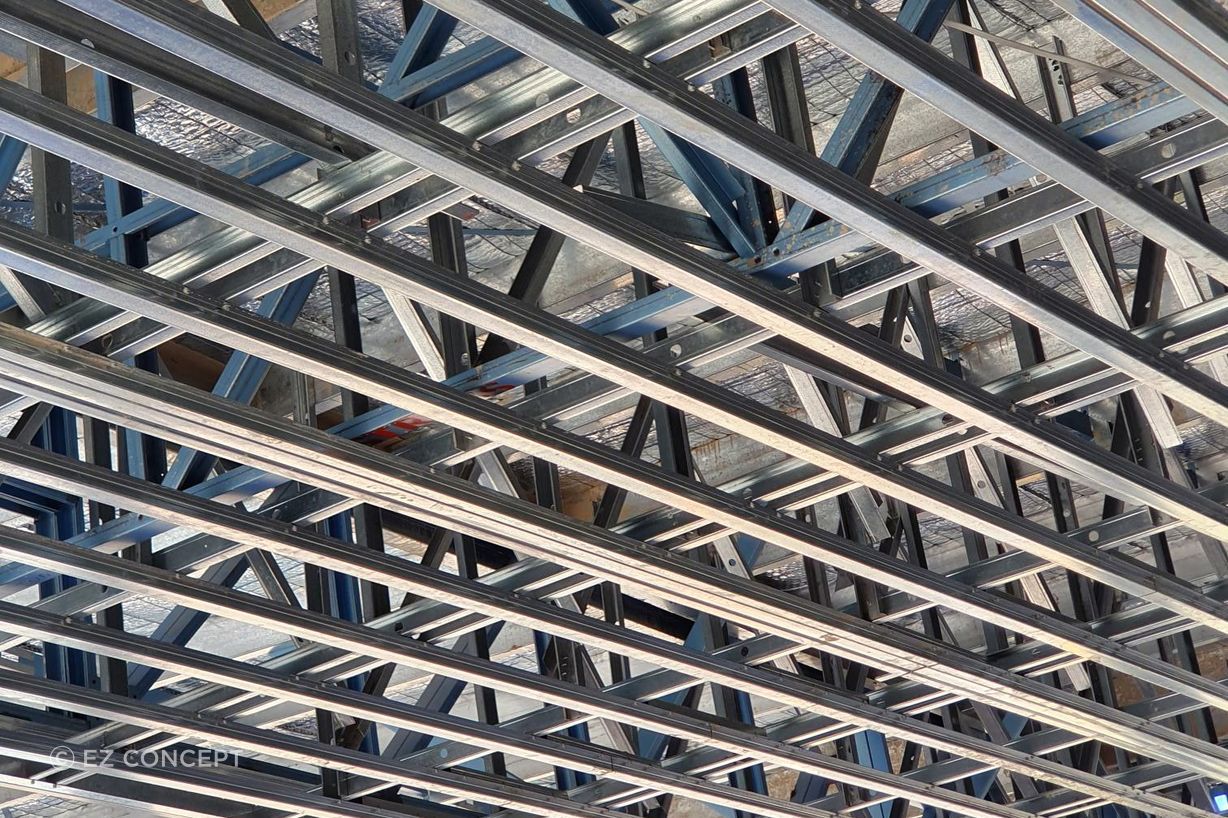 Outdoor ceilings subject to external wind pressure are framed with Studco top hats for maximum strength.