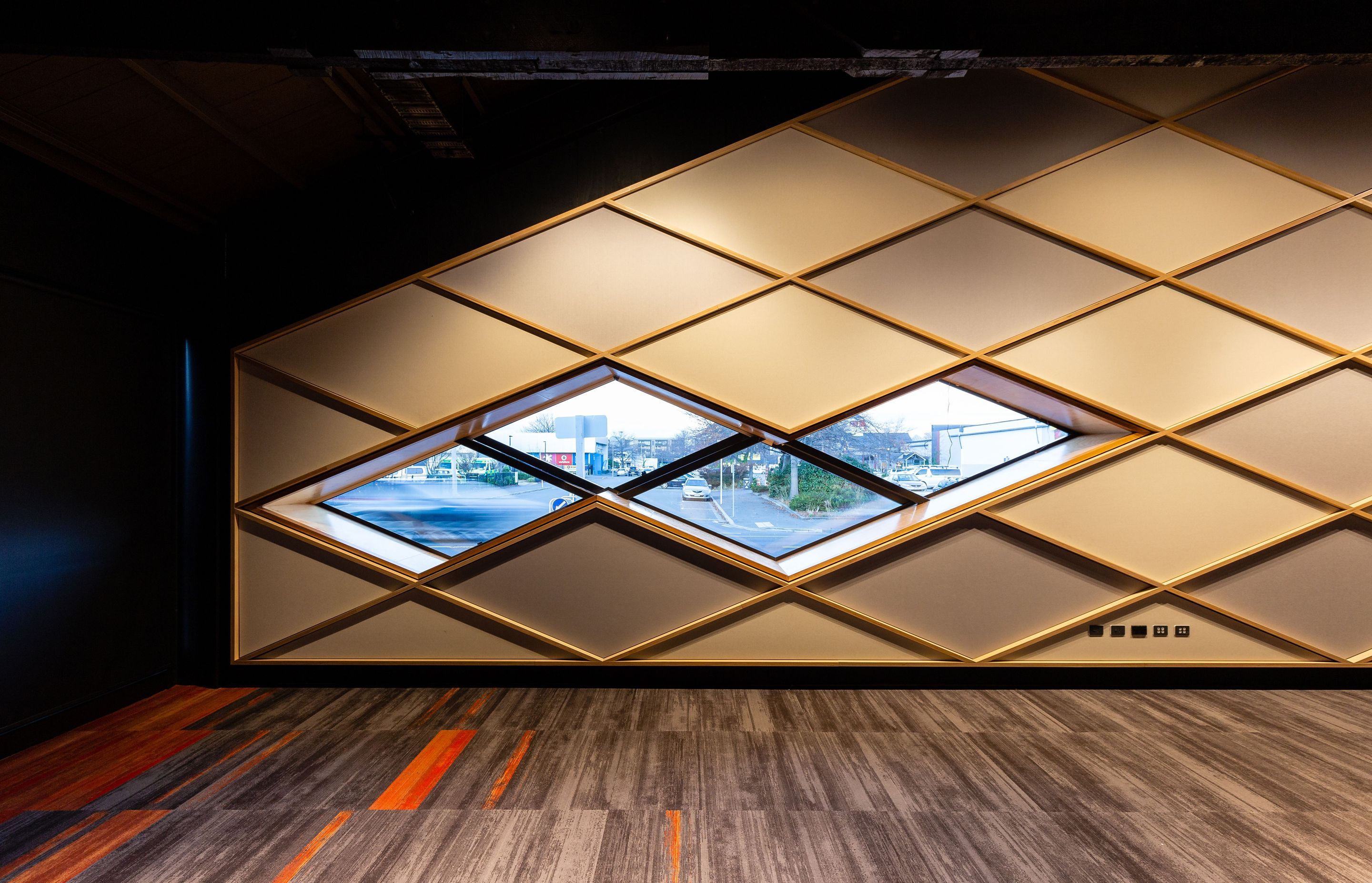 Acoustic break out was one of the major design consideration with the refurbishment.  Acoustic panels have been incorporated into the 'diamond' rear wall feature to provide acoustic absorption over the length of the auditorium.