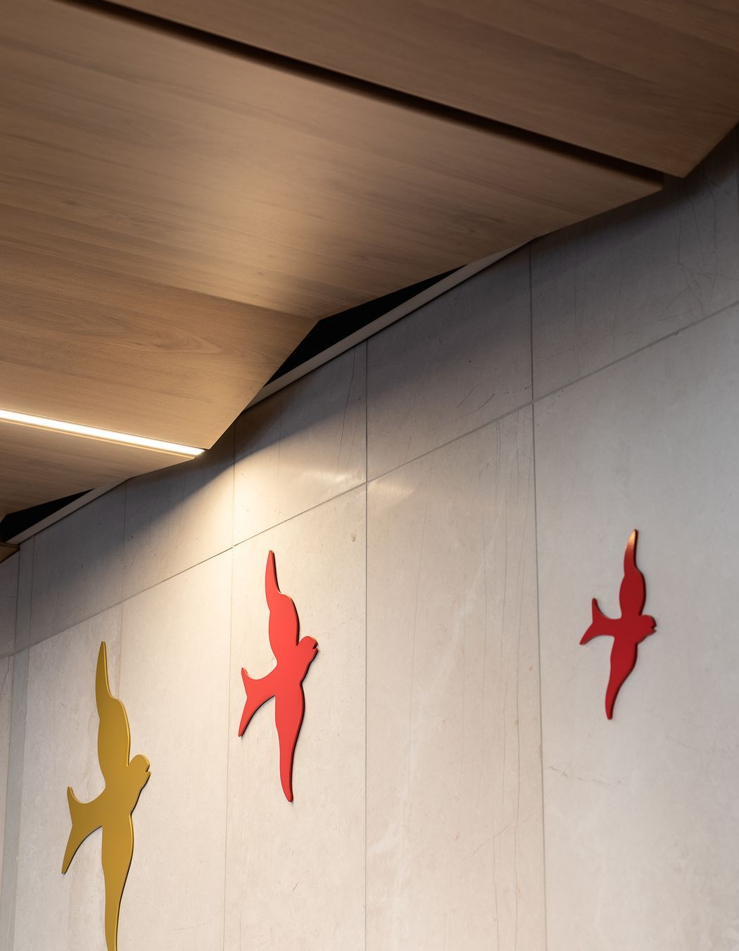 The gallery walkway between the two buildings features a range of local artists' work.  This artwork is by Lonnie Hutchison.
