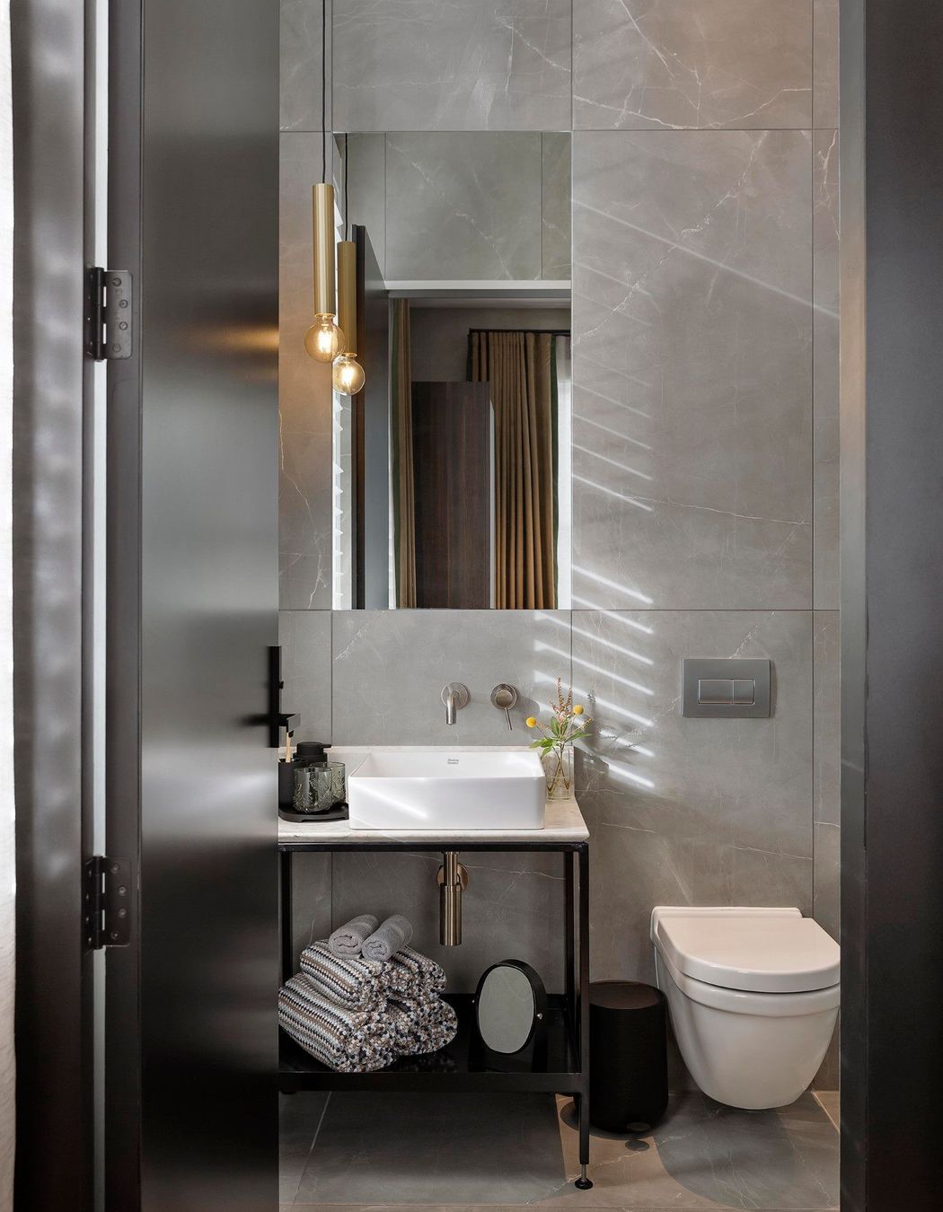 Because of the very limited timeframe quick solutions were key; the existing free floating large basins were replaced with a new vanity unit and smaller basins, using the same plumbing outlets for toiletries.