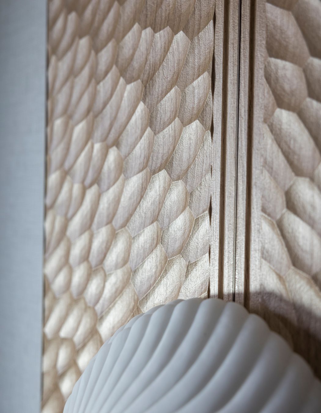 Close up of the carving inspired by the paper nautilus.