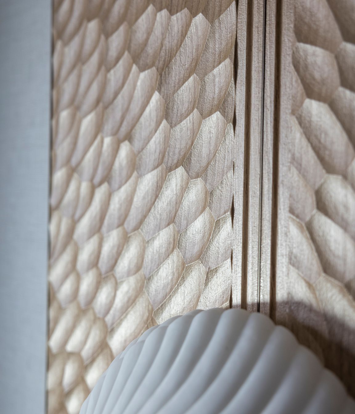 Close up of the carving inspired by the paper nautilus.
