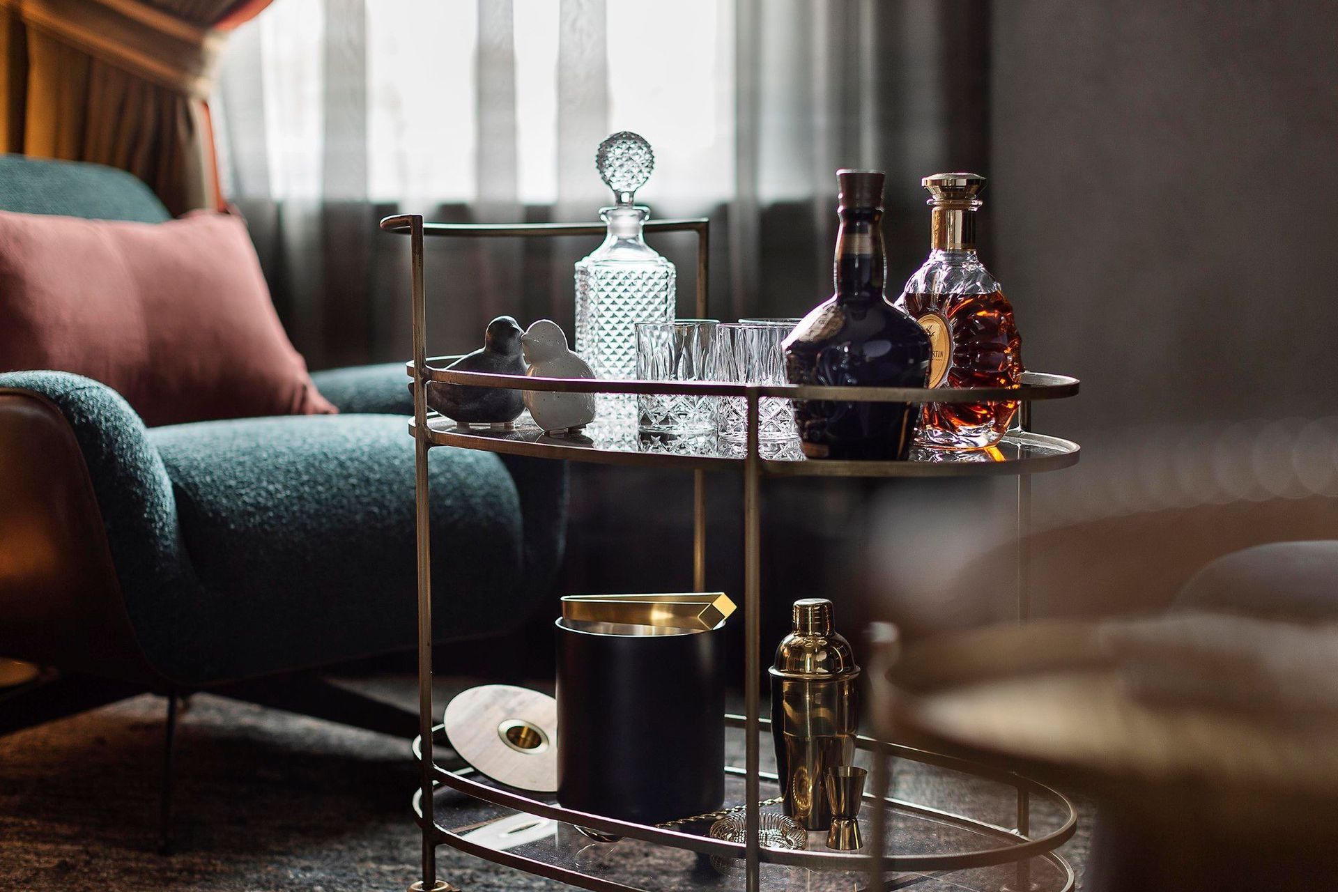 Details right down to drinks trolleys were considered and curated with local art objects and luxurious accessories.