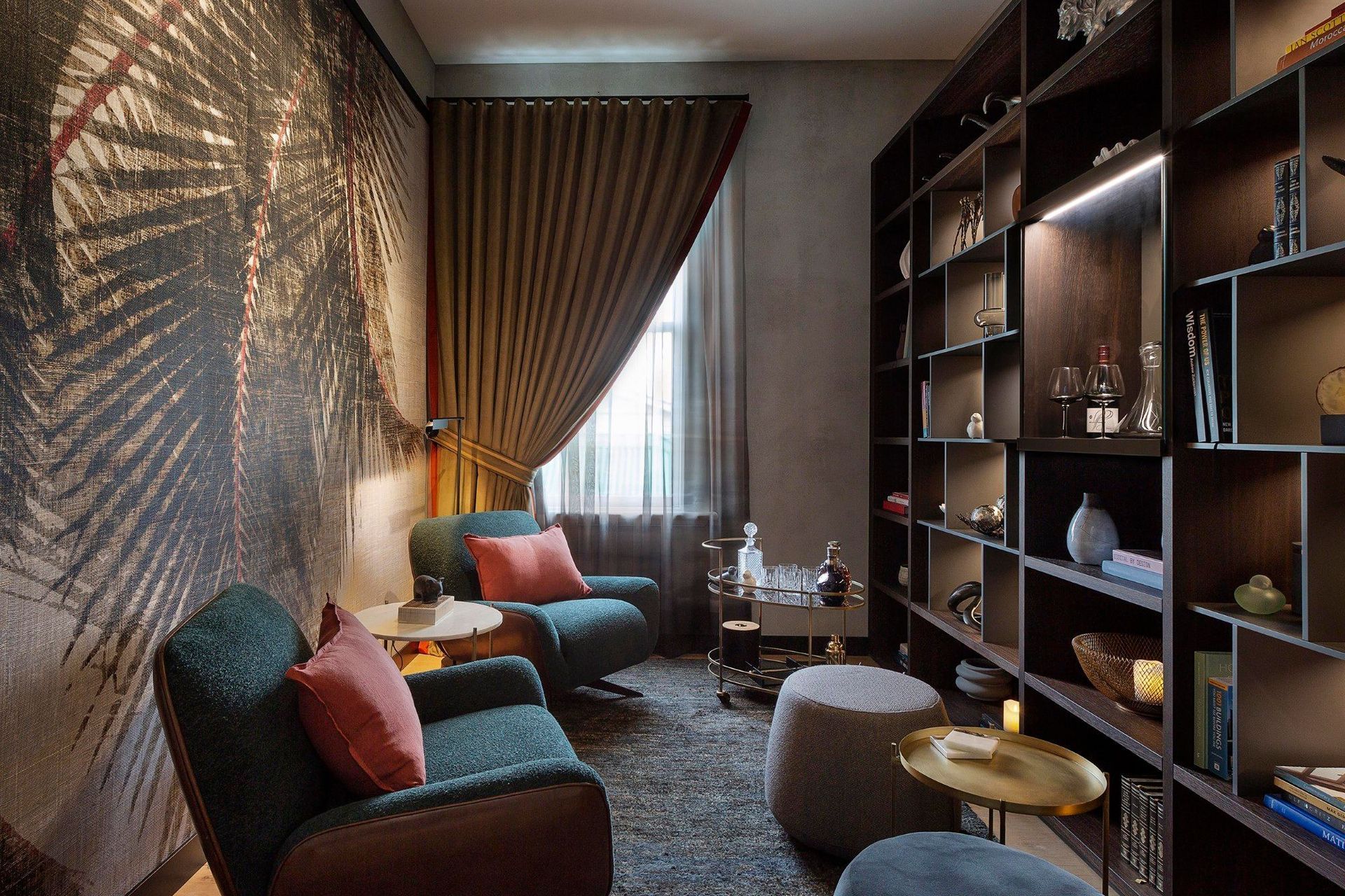 The Library upstairs features a one-off textural show-stopping palm frond wallpaper and is where the guests are treated to drinks, canape’s and hors d'oeuvres.