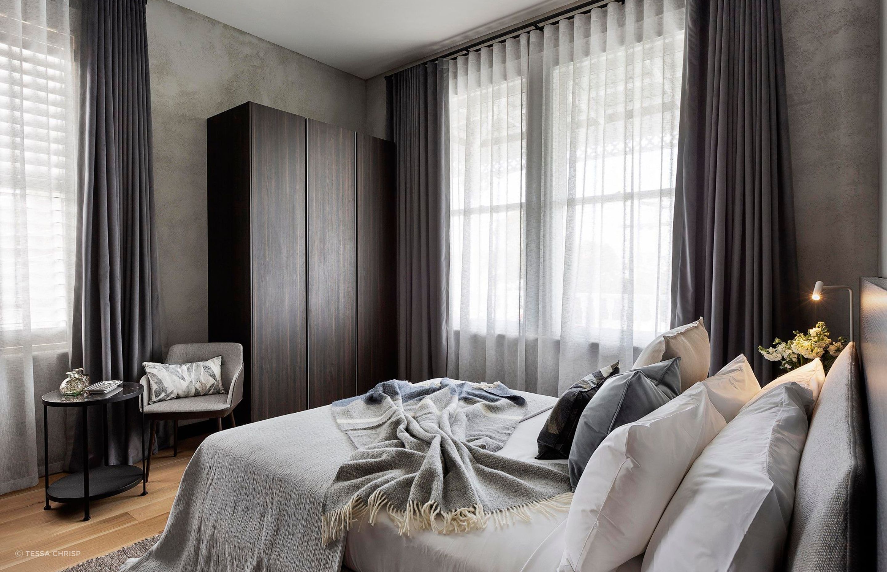 The textural finish on the walls was part of the base build, and was a great starting point for building layers of texture and colour in the rooms.