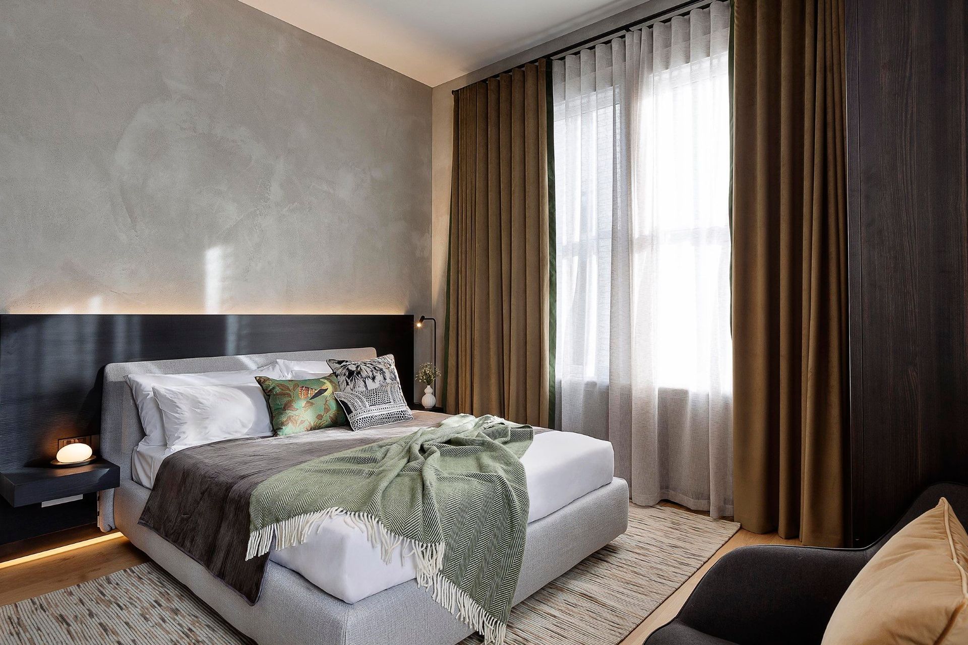 In this room, a contrast curtain colour lifts the room and gives it warmth.