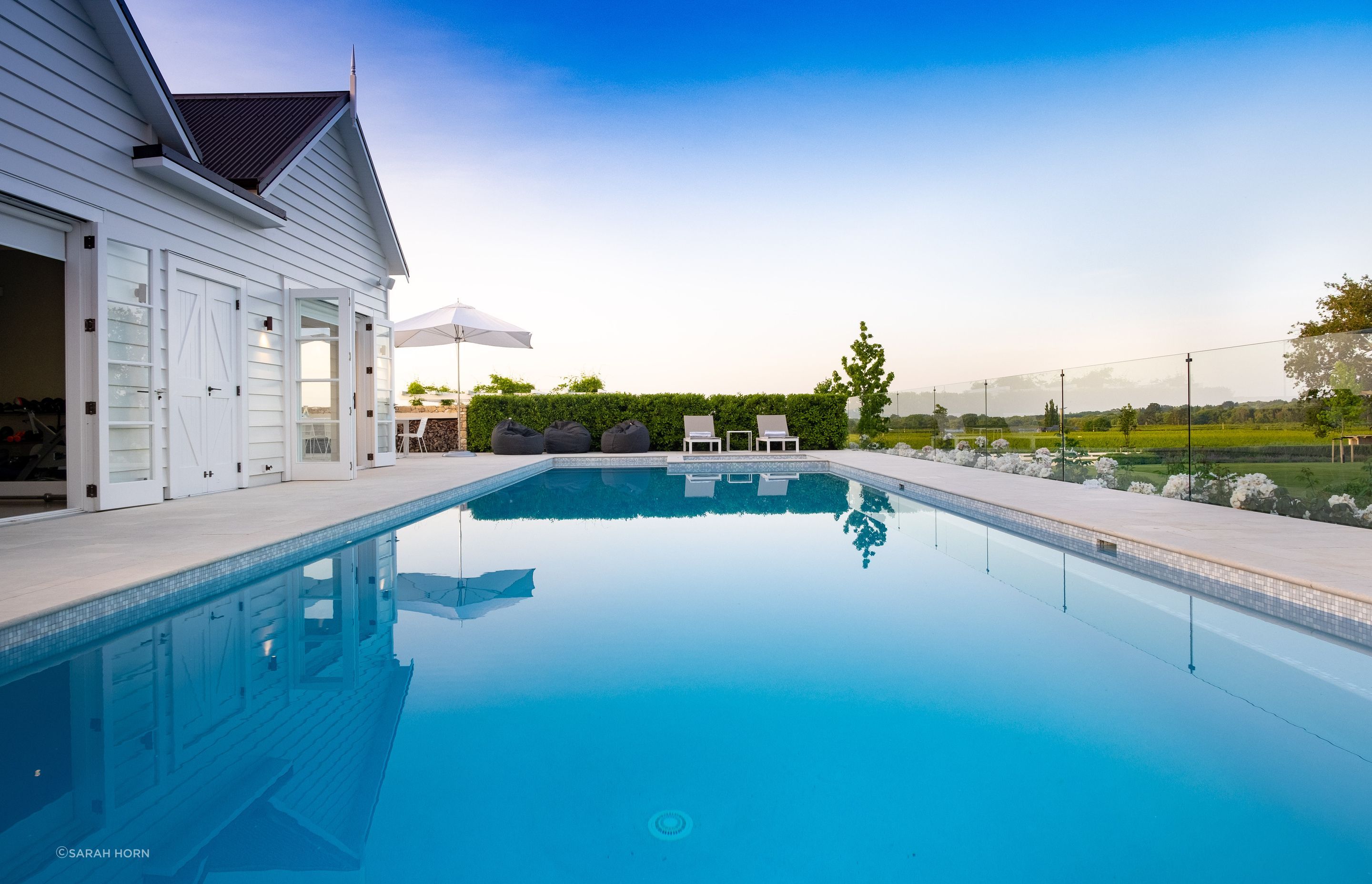 Gym and pool house built from scratch. French doors and detailed exterior doors