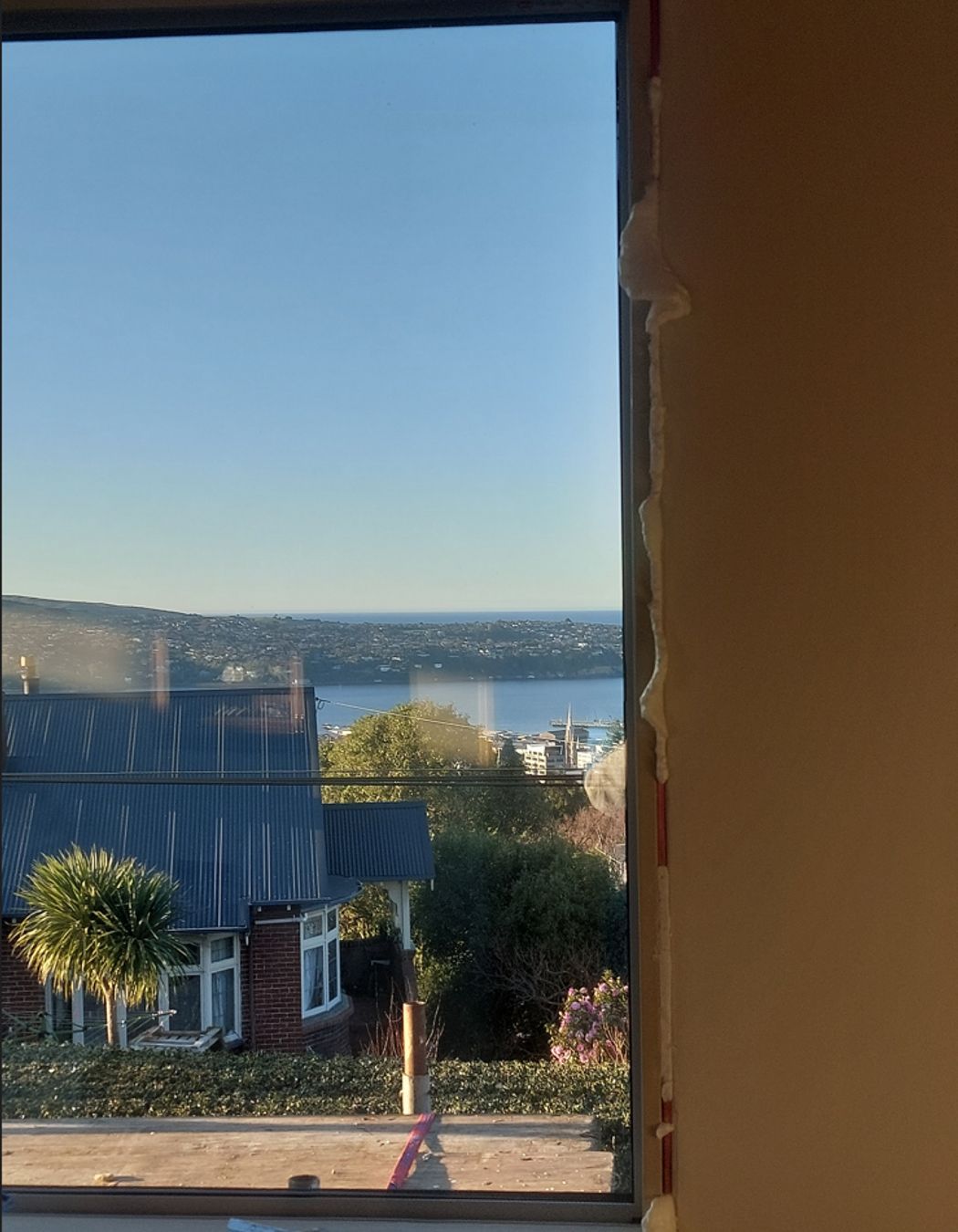 10-19-Tweed-St-Roslyn-Dunedin-Removing-the-old-wooden-window-from-the-loungeroom-JDBuilders.jpg