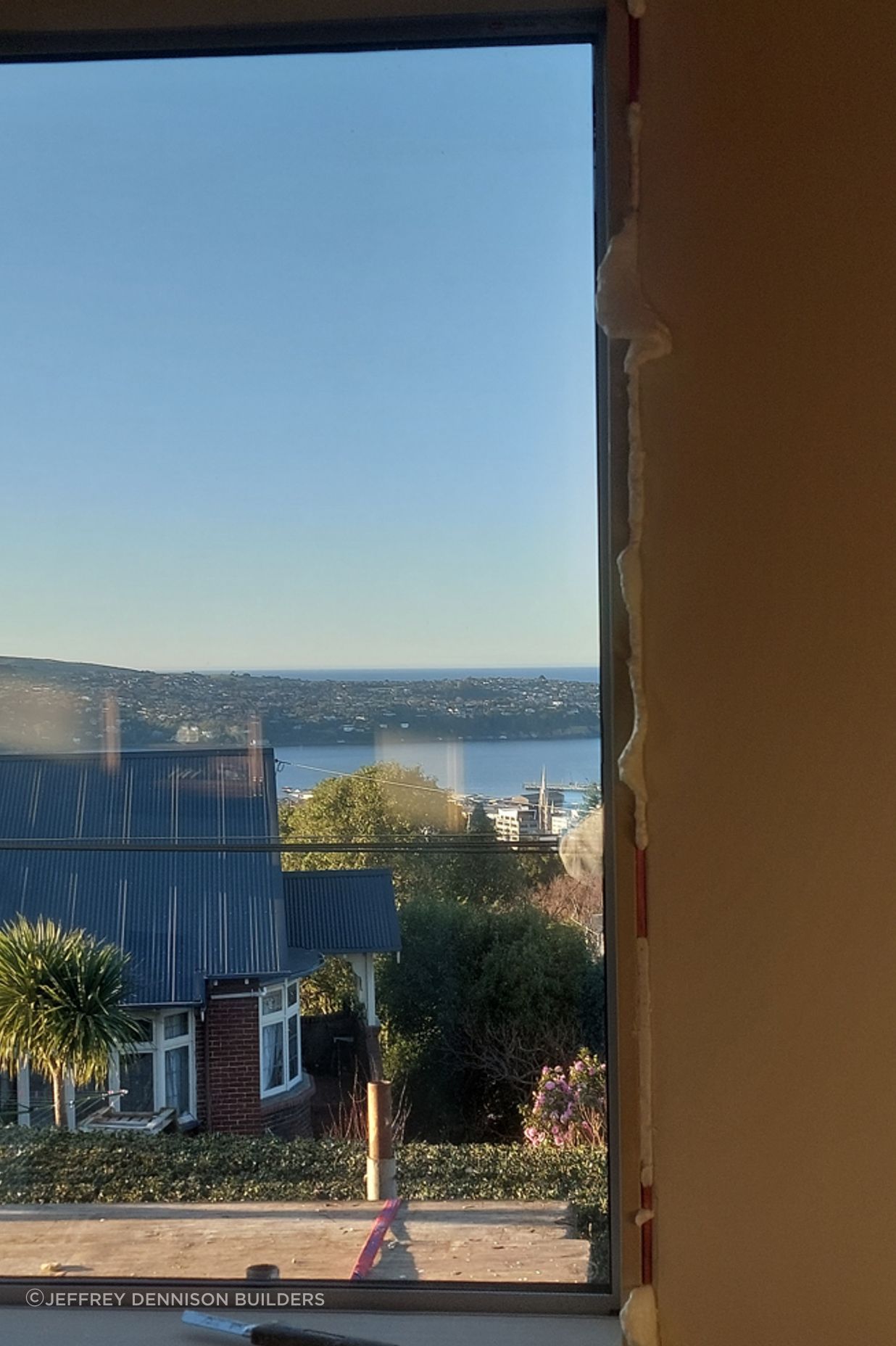 10-19-Tweed-St-Roslyn-Dunedin-Removing-the-old-wooden-window-from-the-loungeroom-JDBuilders.jpg